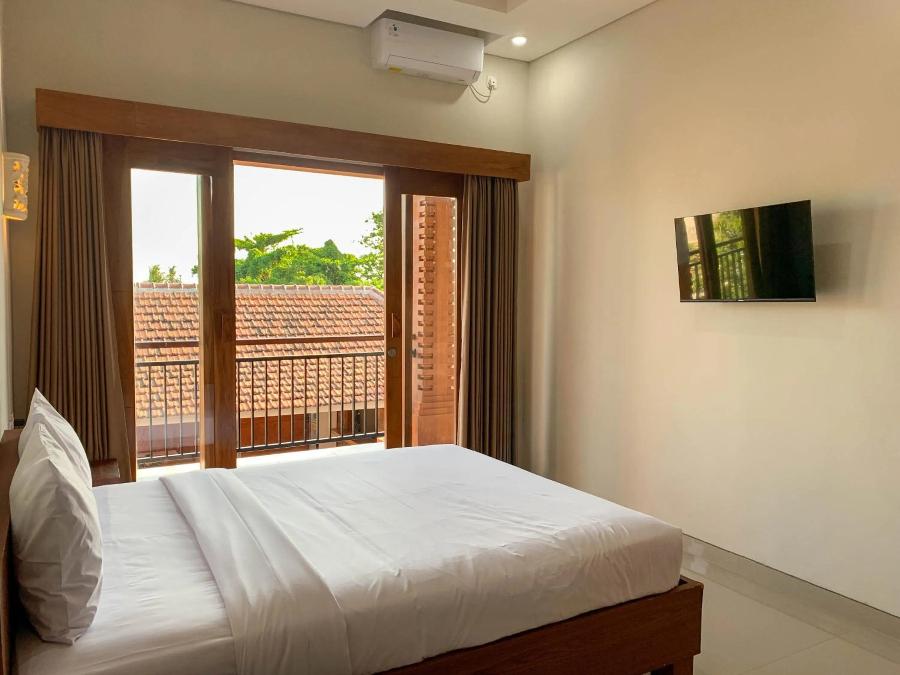 Bedroom, Bed in Candra Loka Studio & Apartment by The Loka