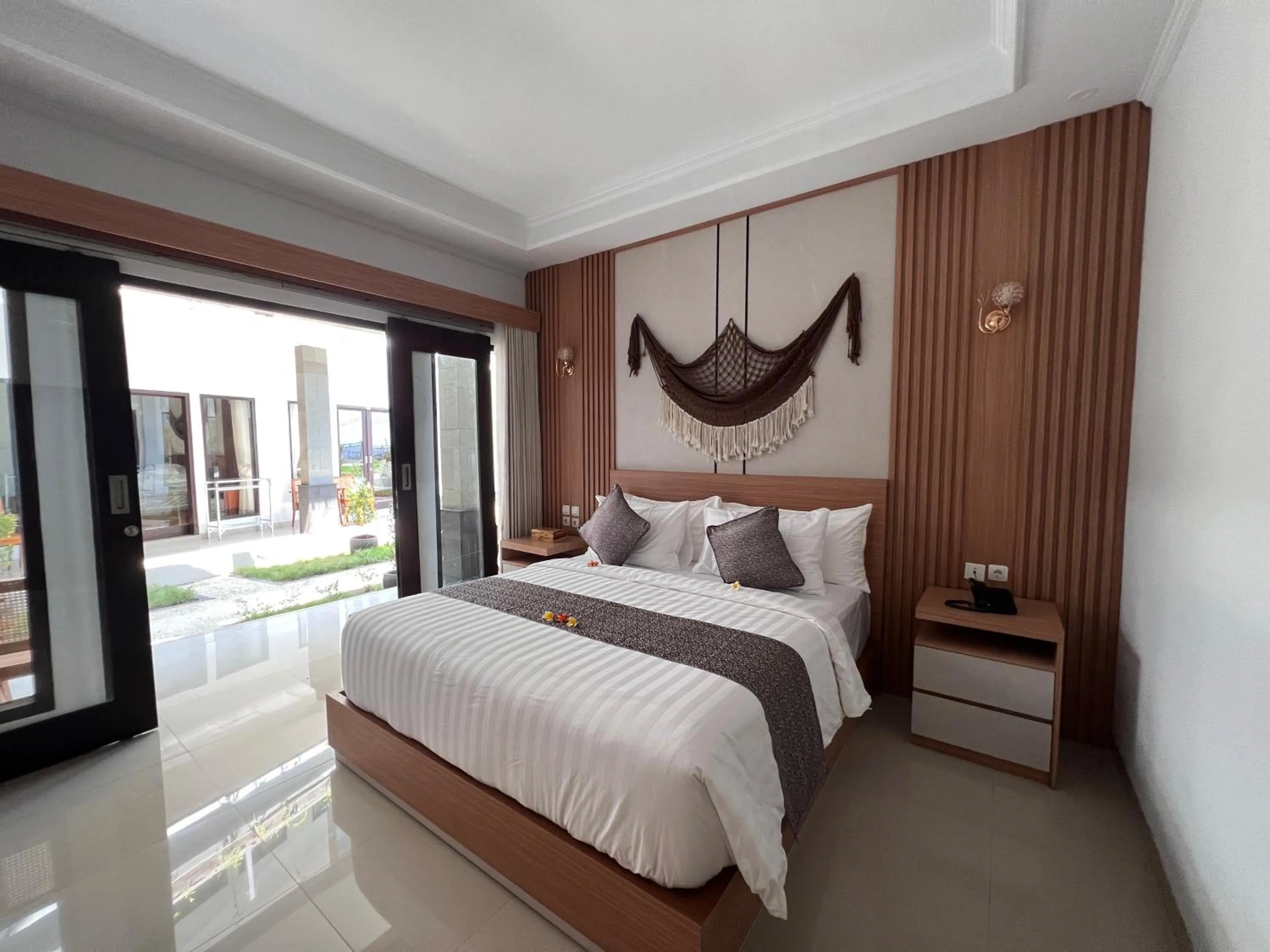Bedroom, Bed in Grand Yuna Hotel Nusa Penida