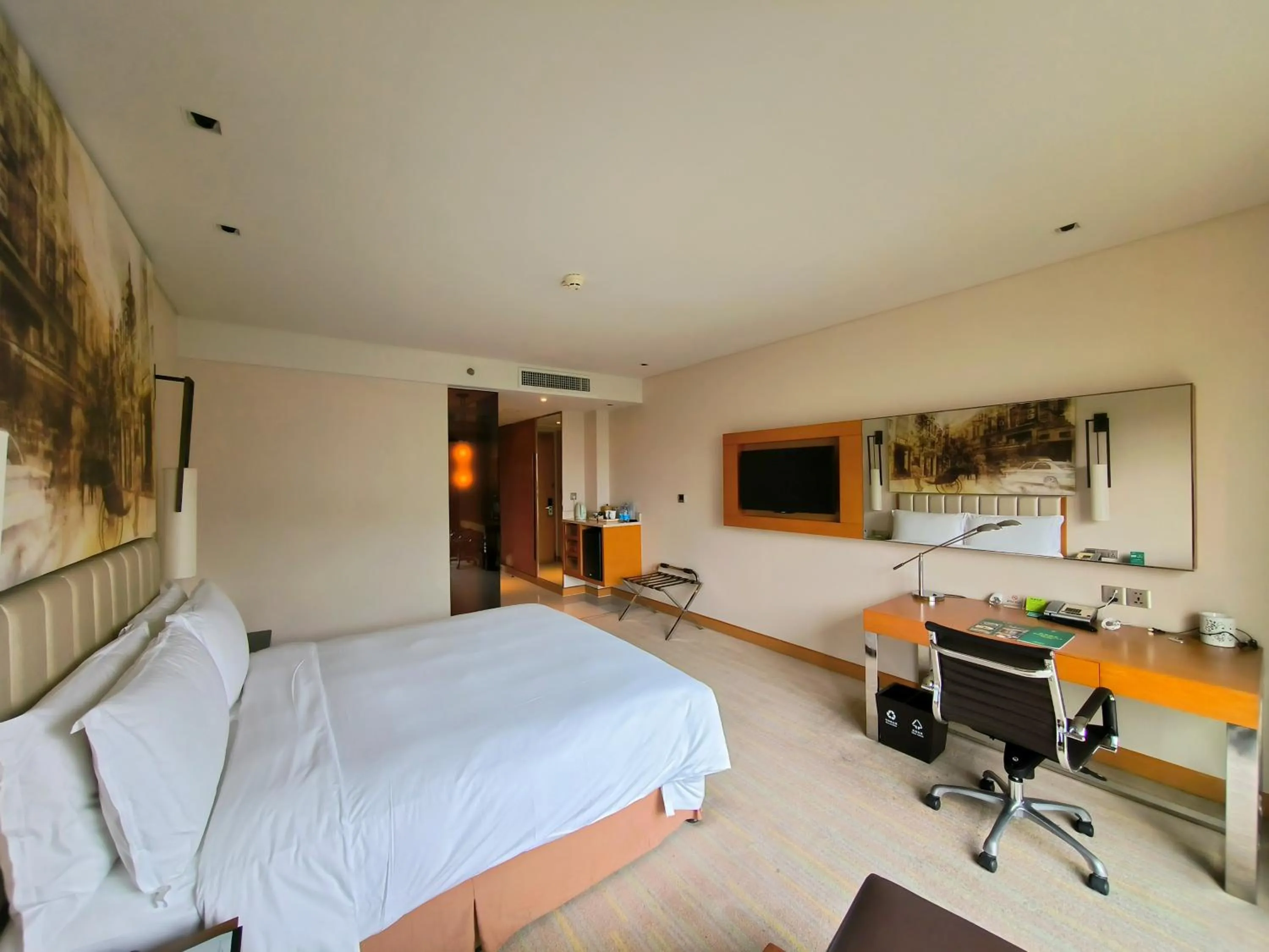 Photo of the whole room in Junluxe Hotel Guangzhou Science City-Free Shuttle Bus Service to Guangzhou Canton Fair