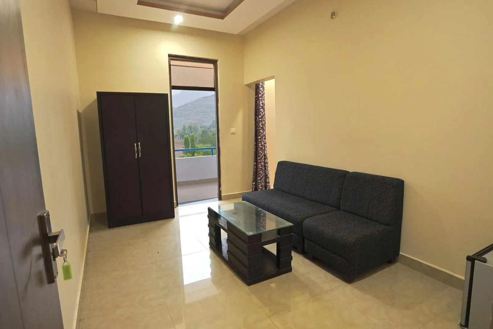 Seating area in Meera Valley Resort By Nexottel