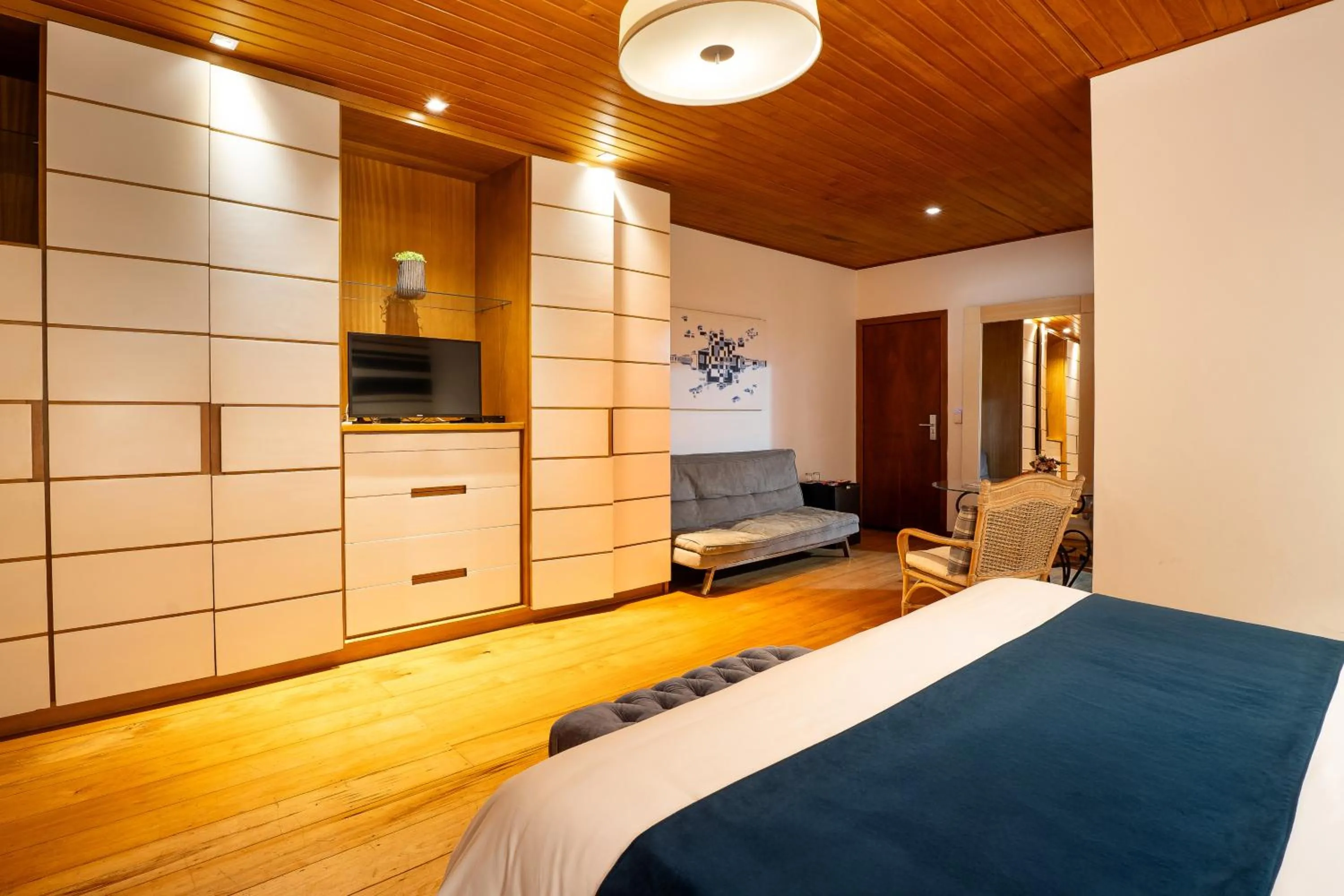 Photo of the whole room, Bed in Pousada Apple House Campos do Jordao