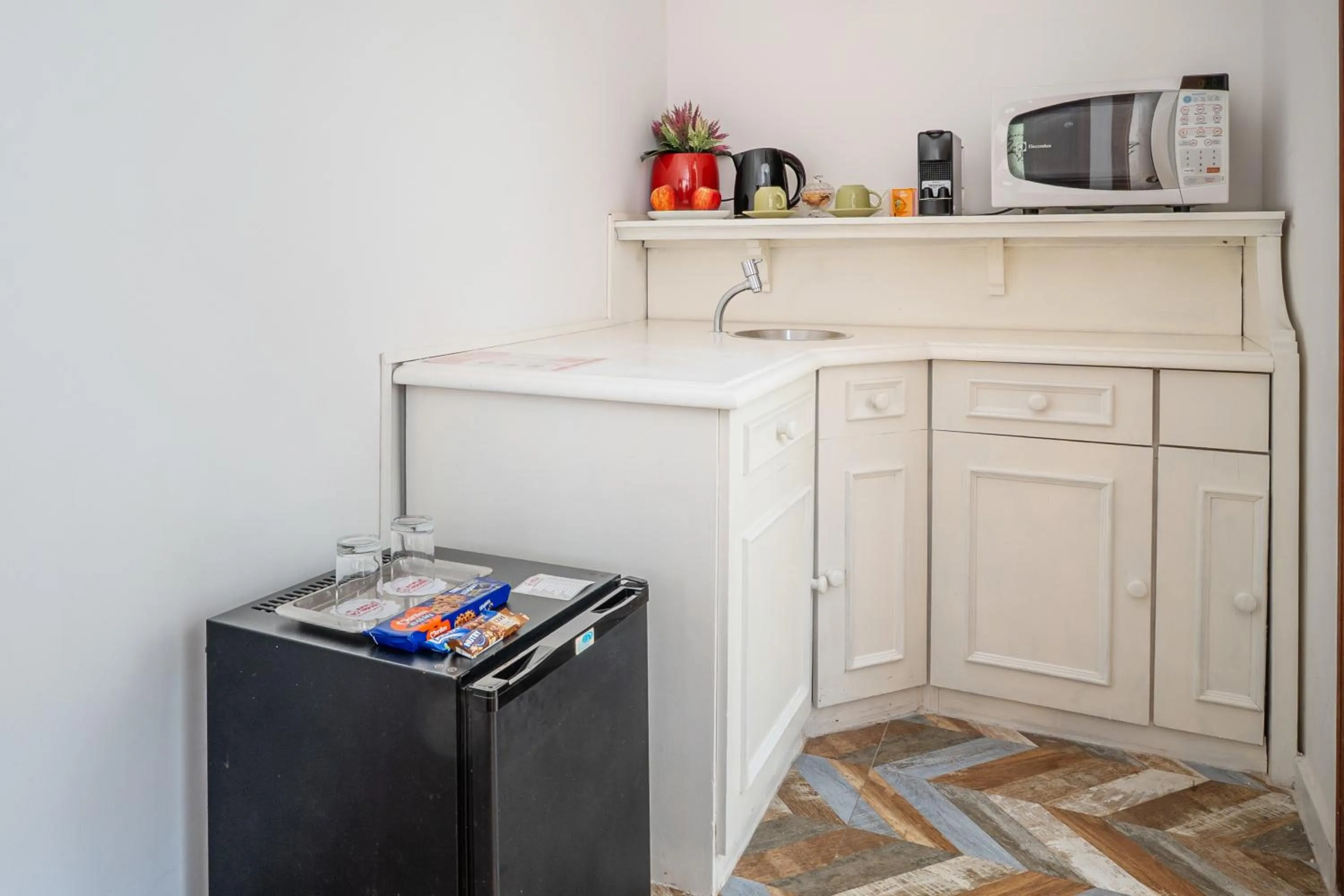 microwave in Pousada Apple House Campos do Jordao