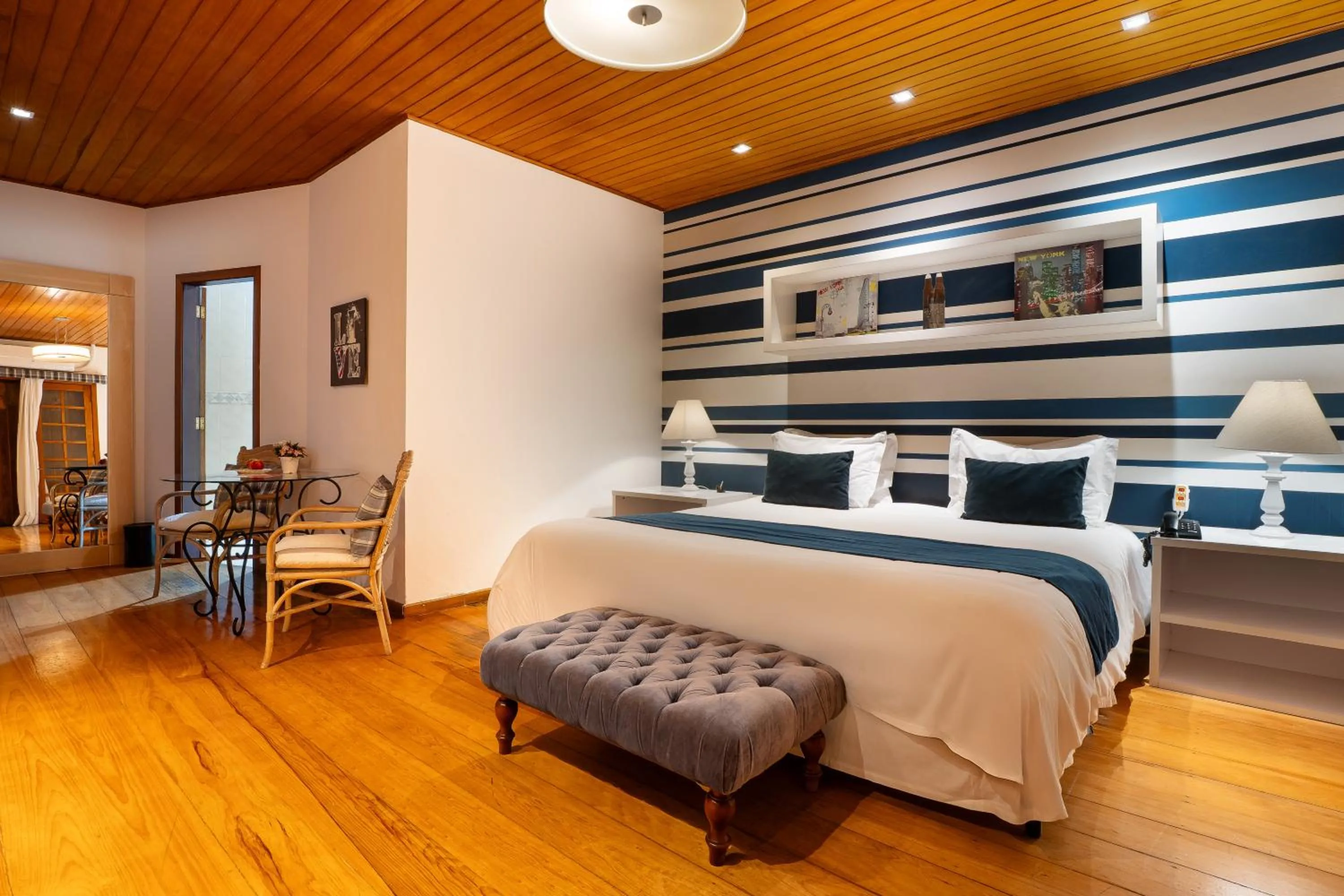 Photo of the whole room, Bed in Pousada Apple House Campos do Jordao