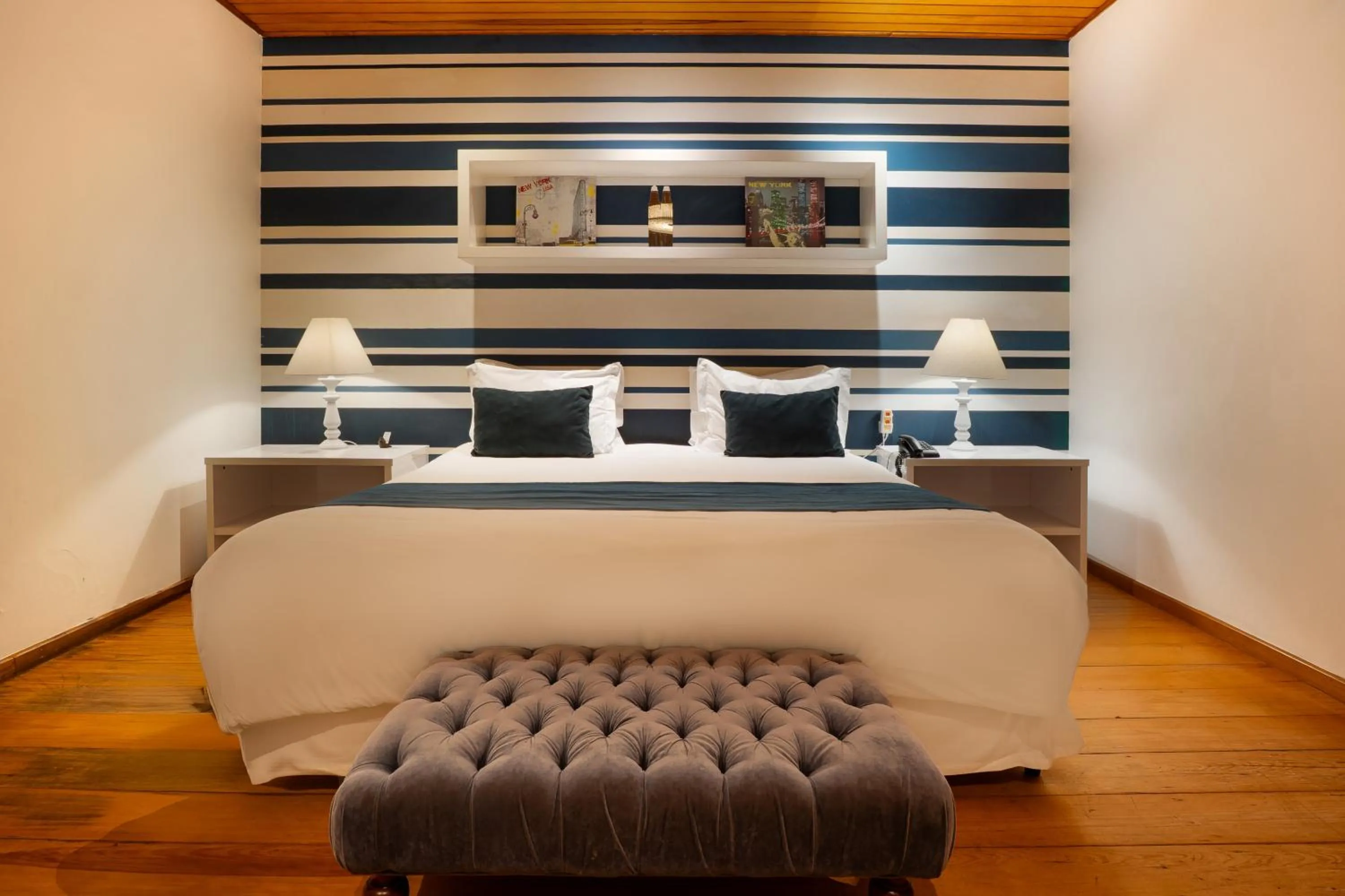 Photo of the whole room, Bed in Pousada Apple House Campos do Jordao