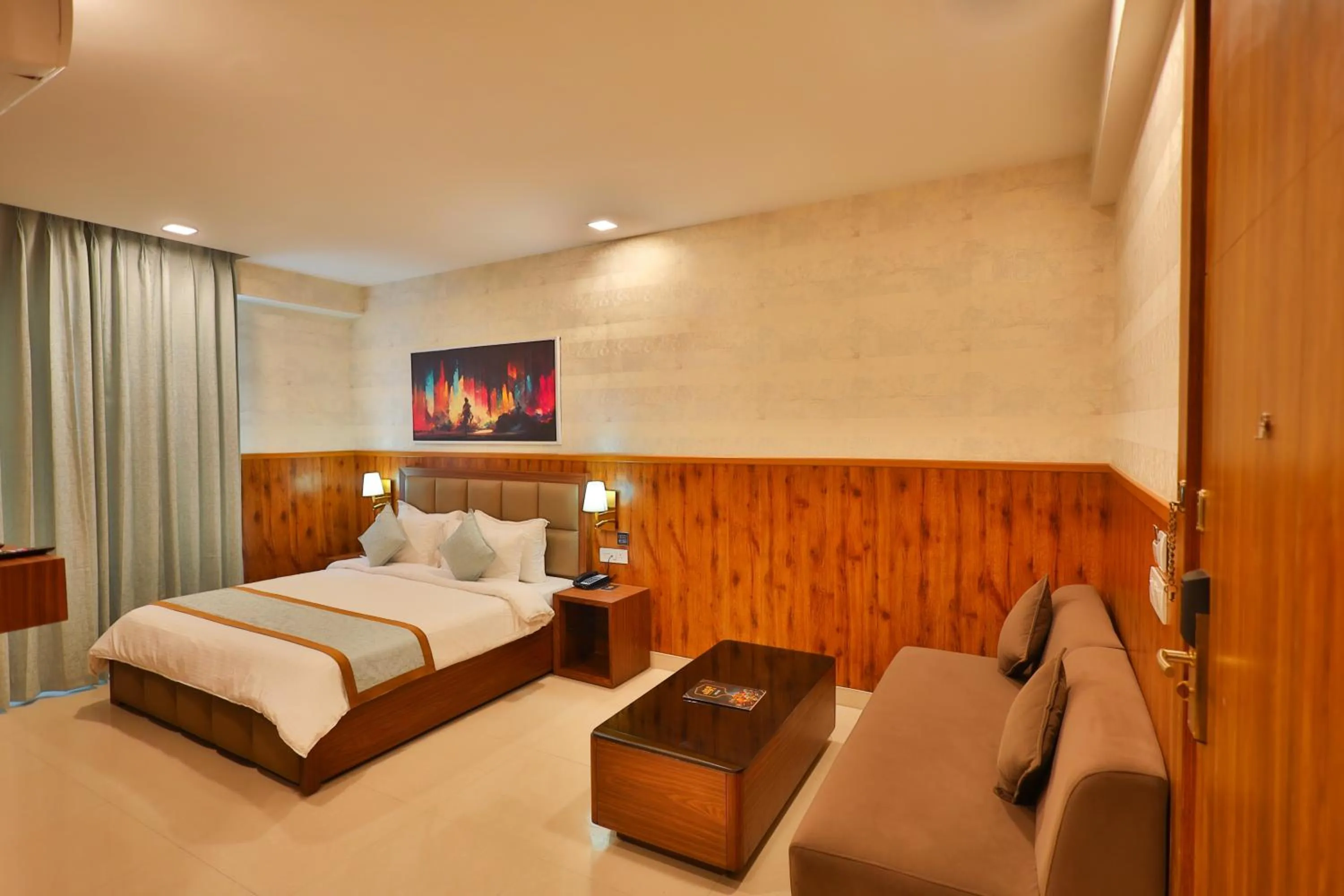 Seating area, Bed in Clay Inn Hotel, Sohna Road, Sector 49, Gurugram