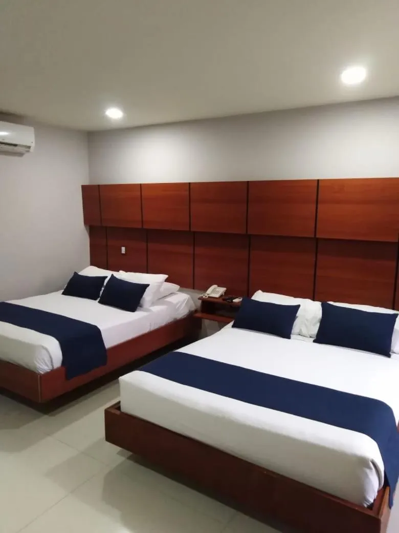 Bed in Hotel Caribe 79