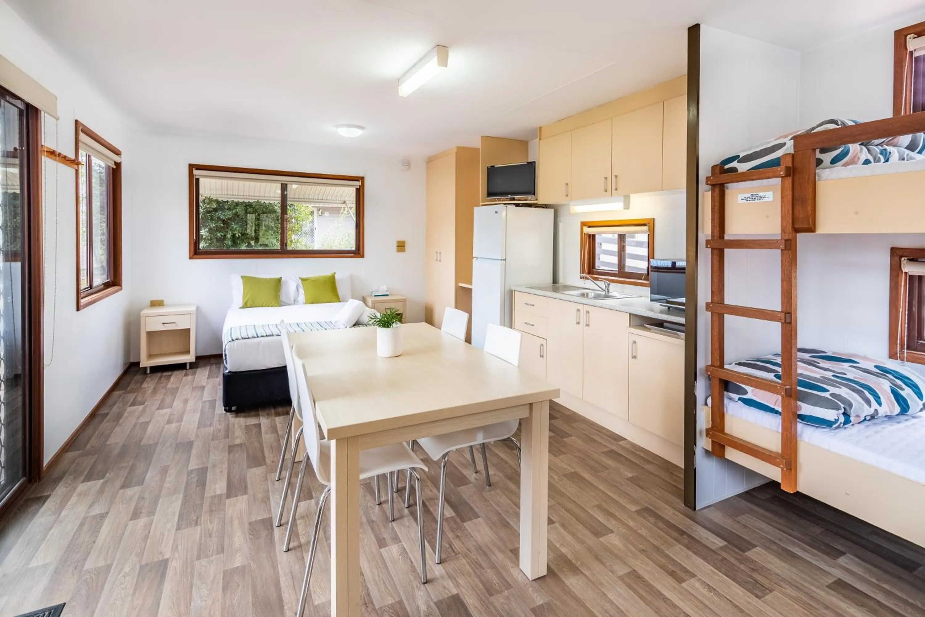 Seating area, Bed in NRMA Broulee Holiday park