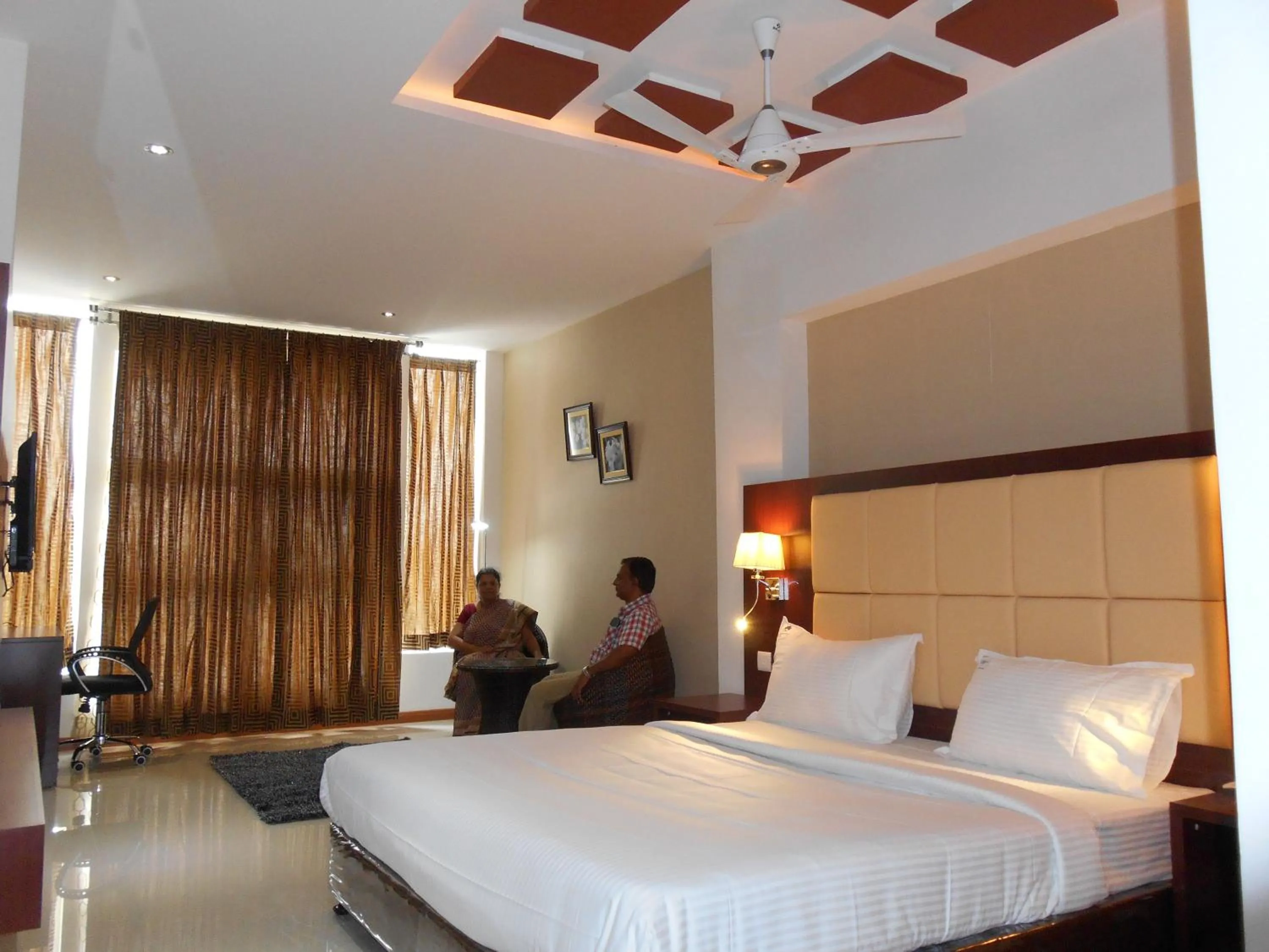 Photo of the whole room, Bed in Rajmahal Inn