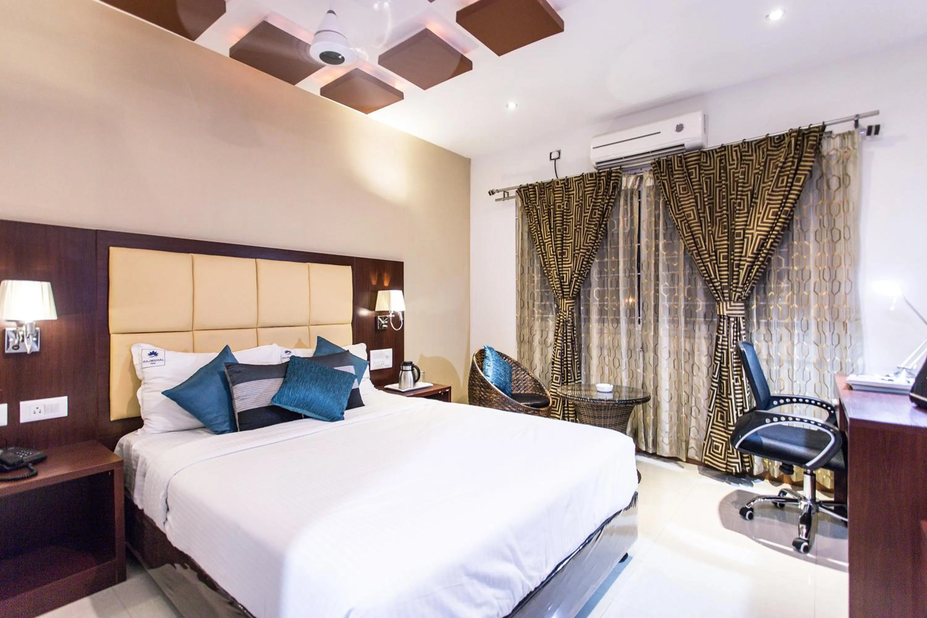 Photo of the whole room, Bed in Rajmahal Inn