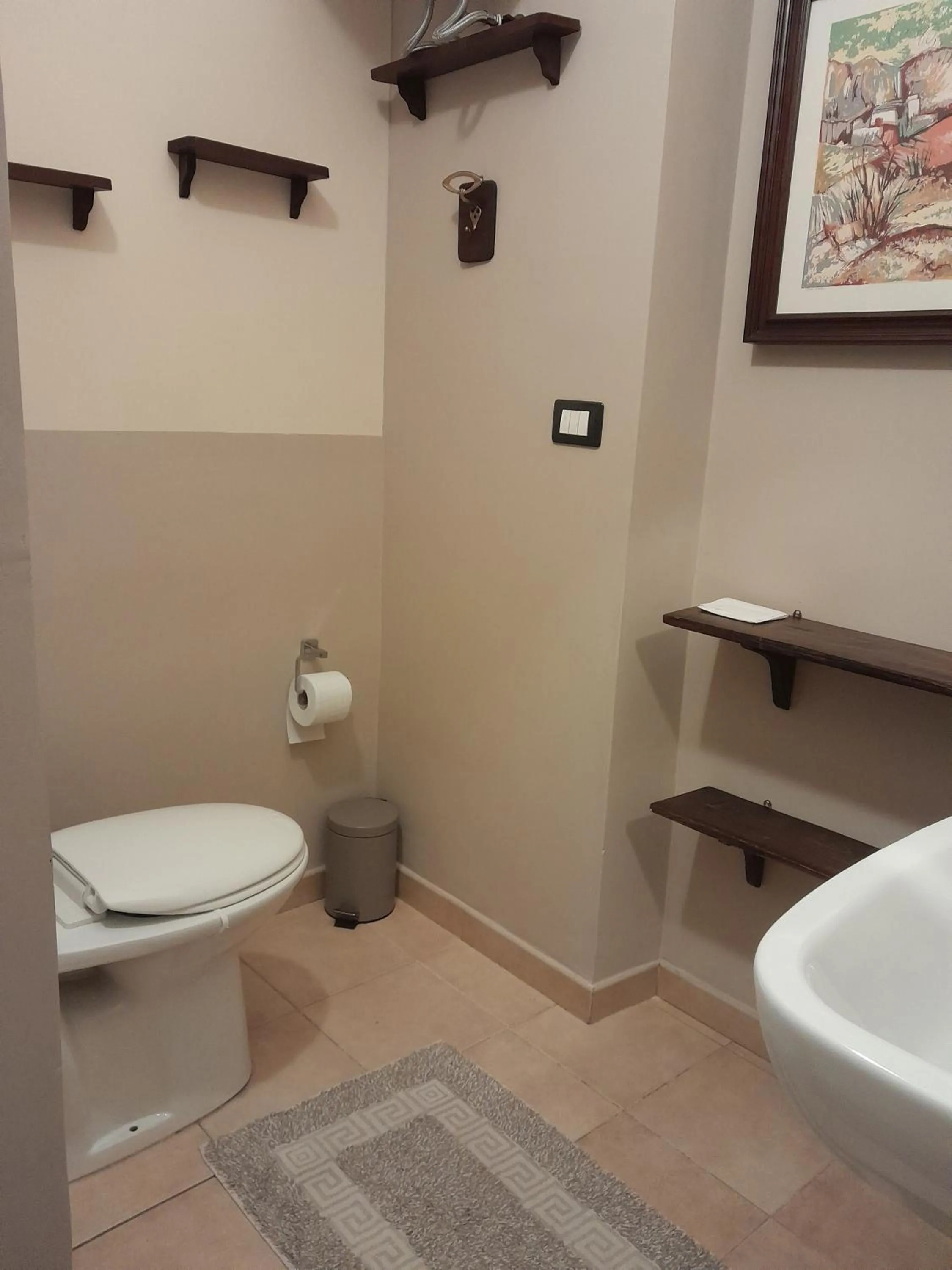 Toilet in Casa Castelli Holiday Apartment