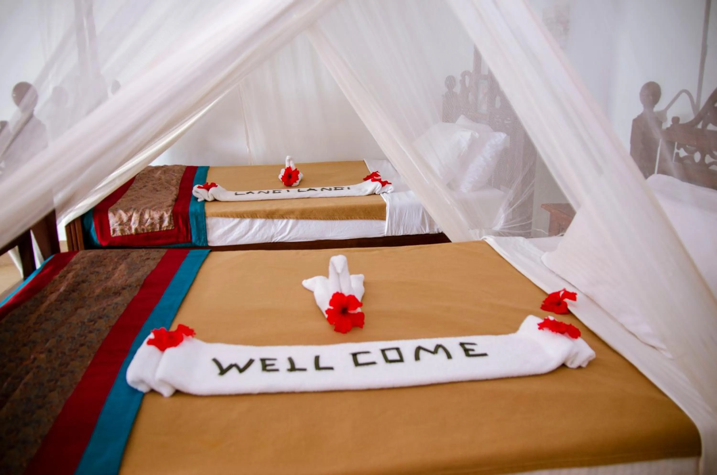 Bed in Langi Langi Beach Bungalows