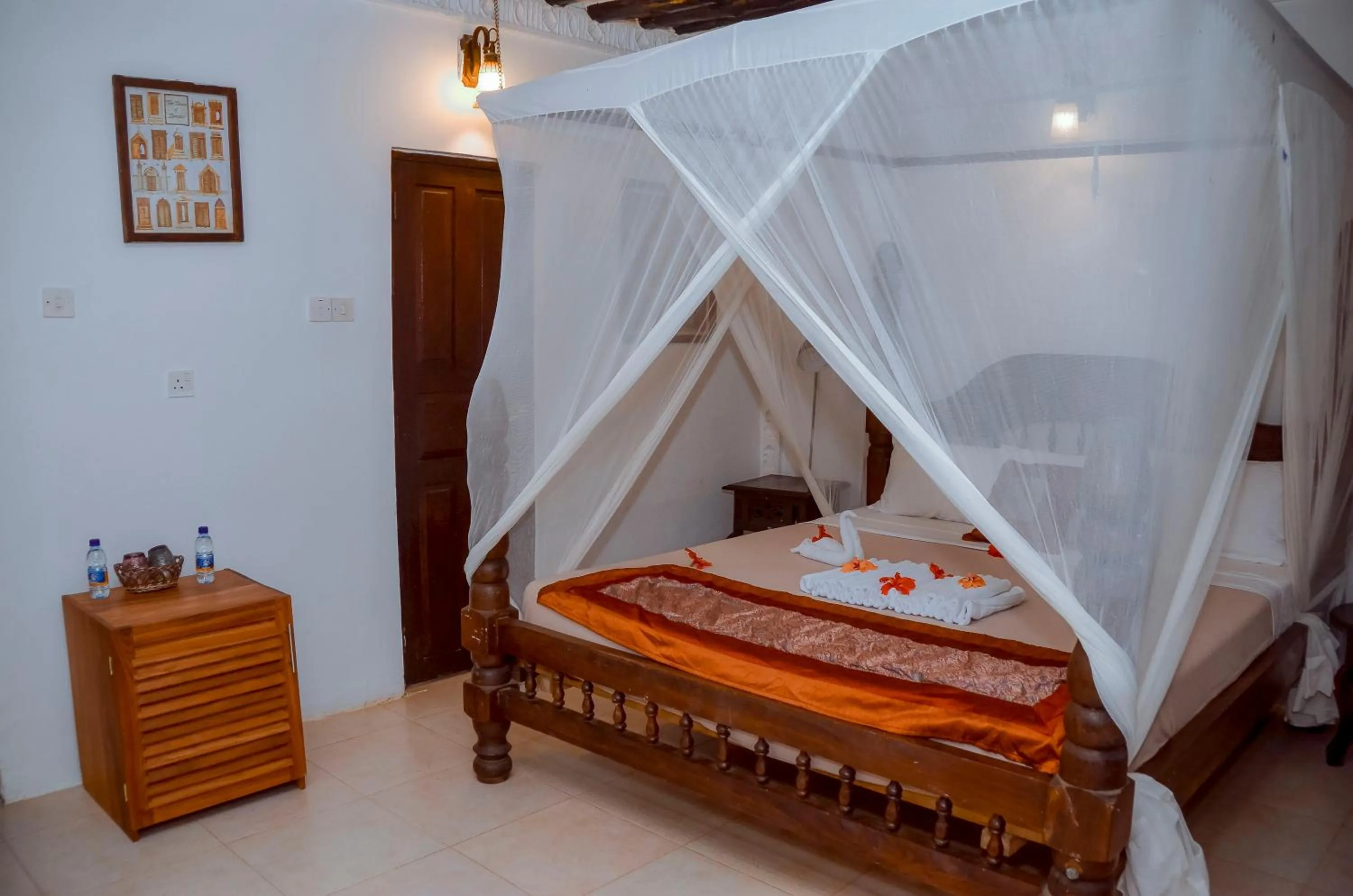 Bed in Langi Langi Beach Bungalows