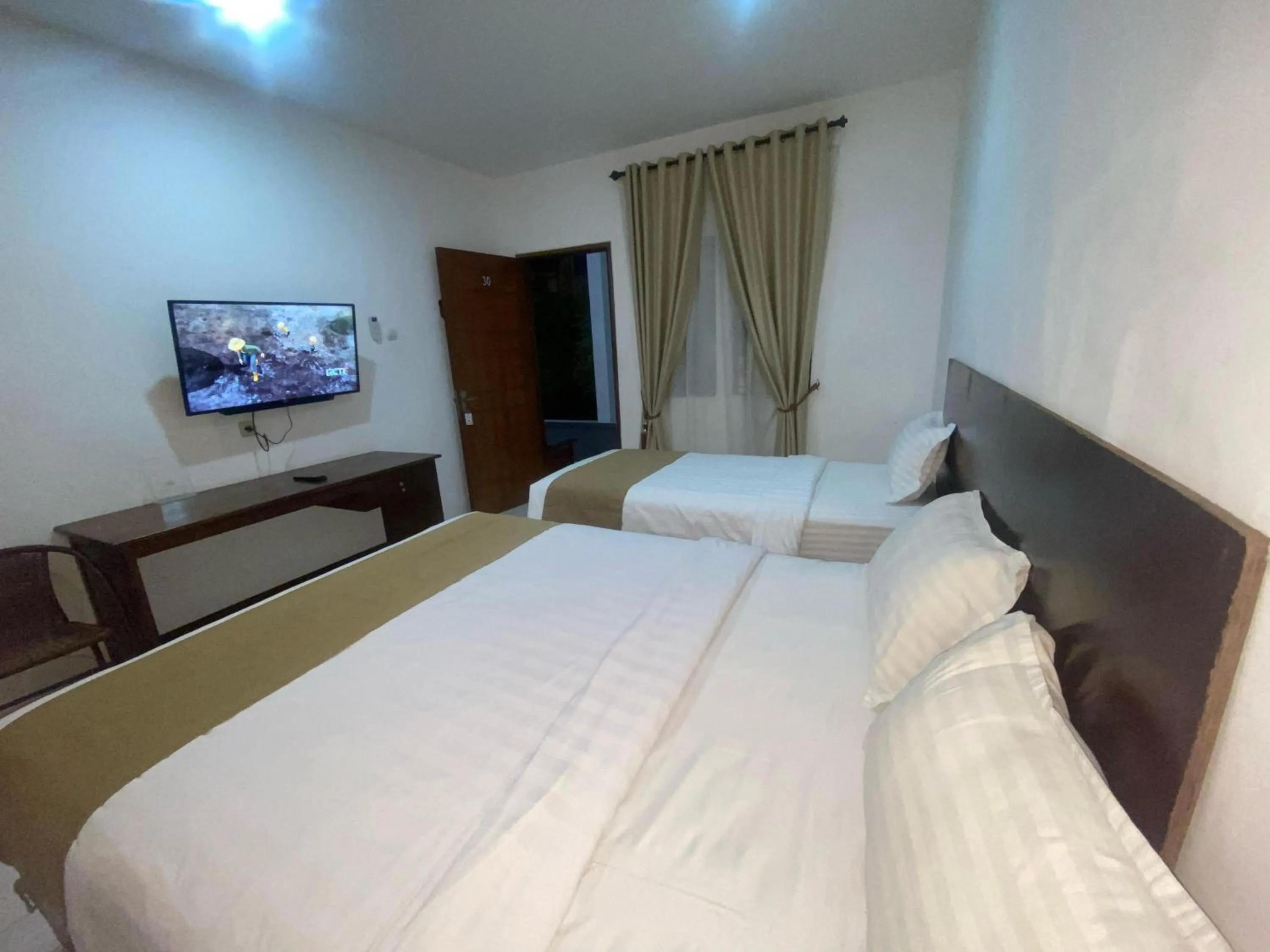 Bed in Hotel Netral Jombang