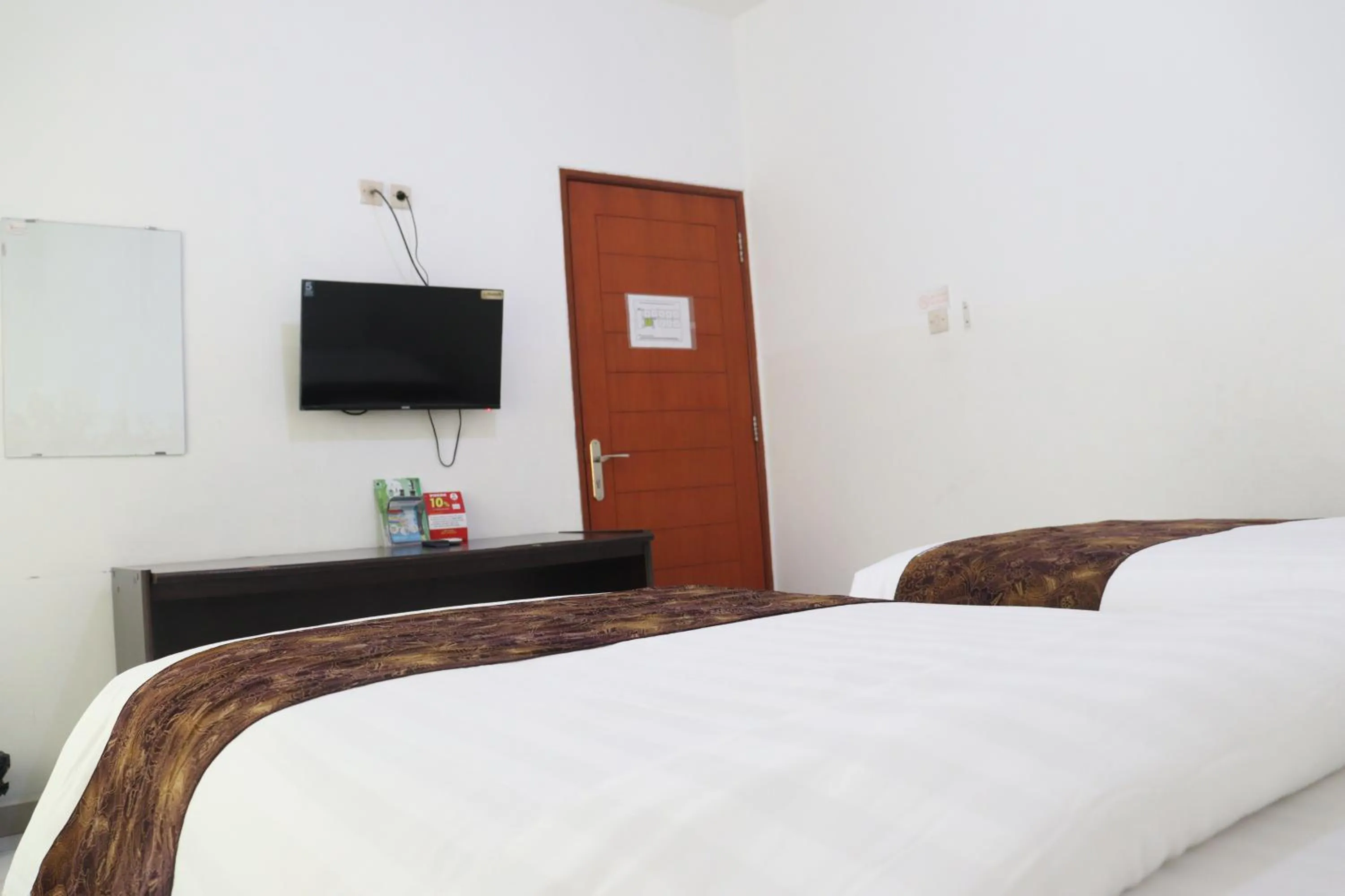 Bed in Hotel Netral Jombang