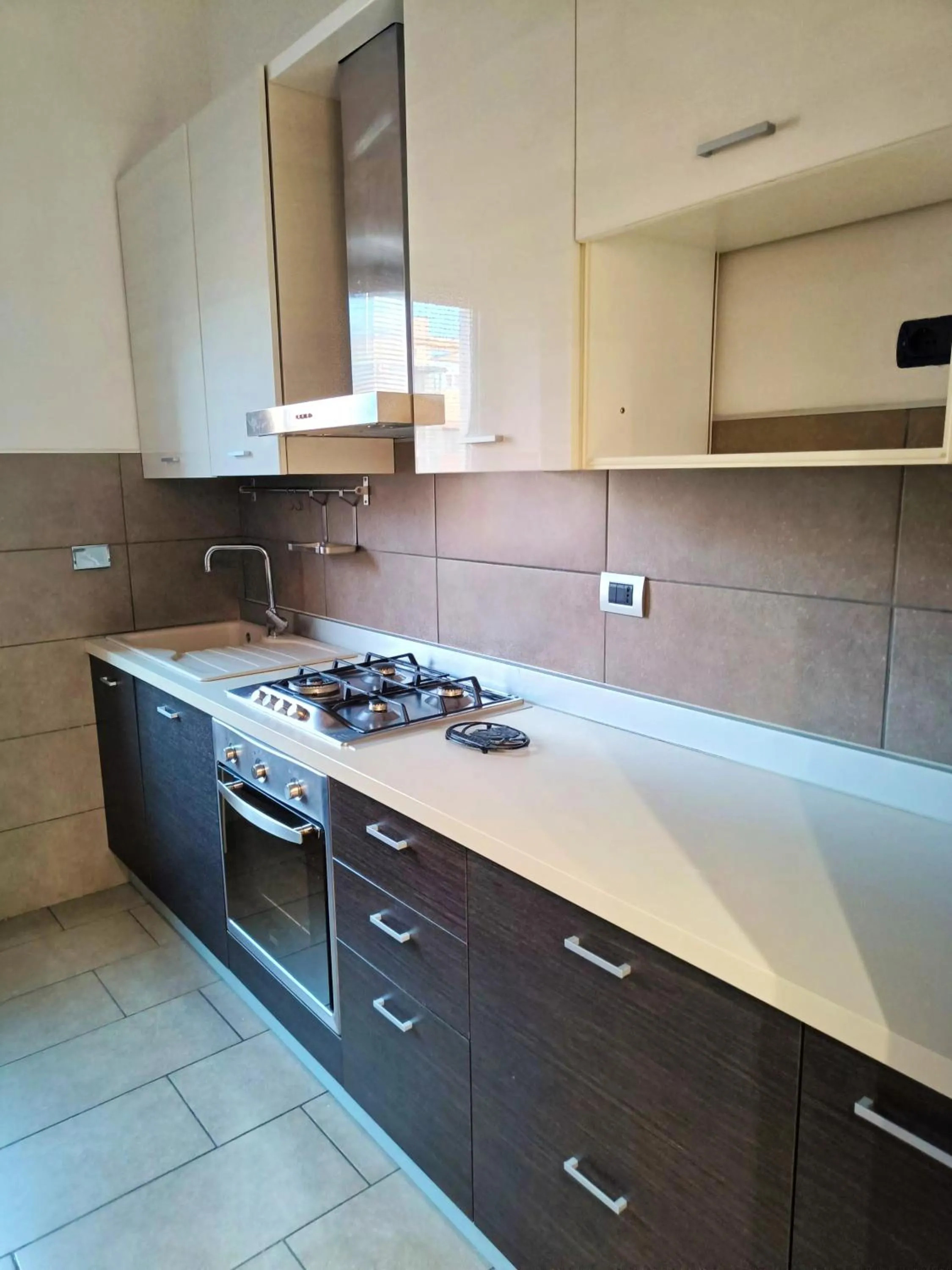 Kitchen or kitchenette in Tia Tourist Apartment Rome