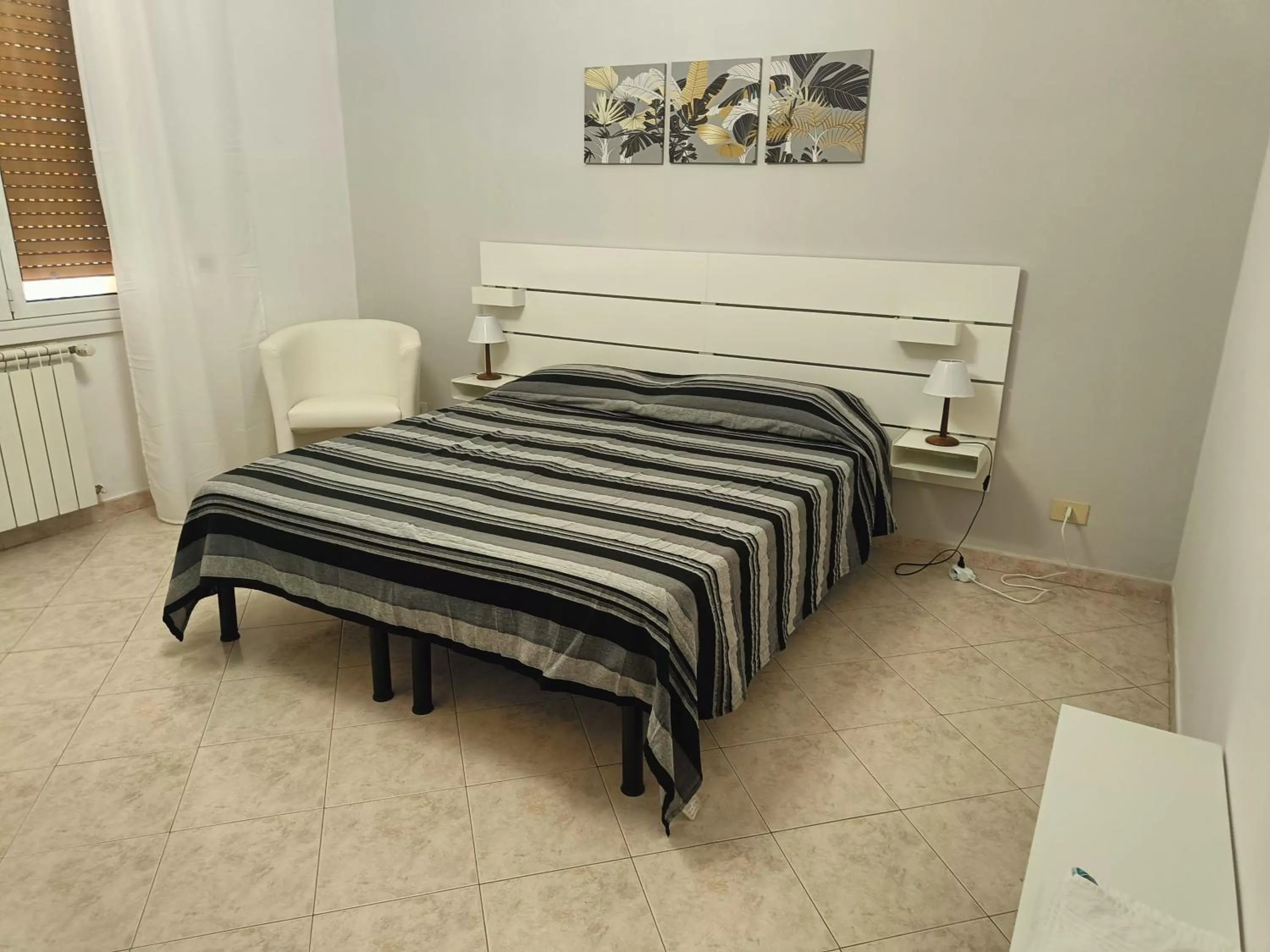 Bedroom, Bed in Tia Tourist Apartment Rome