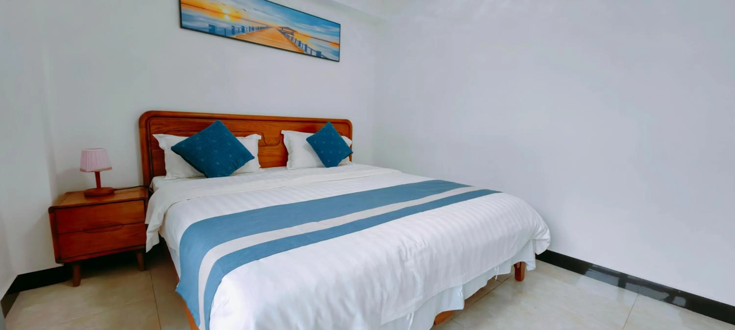 Bedroom, Bed in Ocean Breeze Apartment Hotel