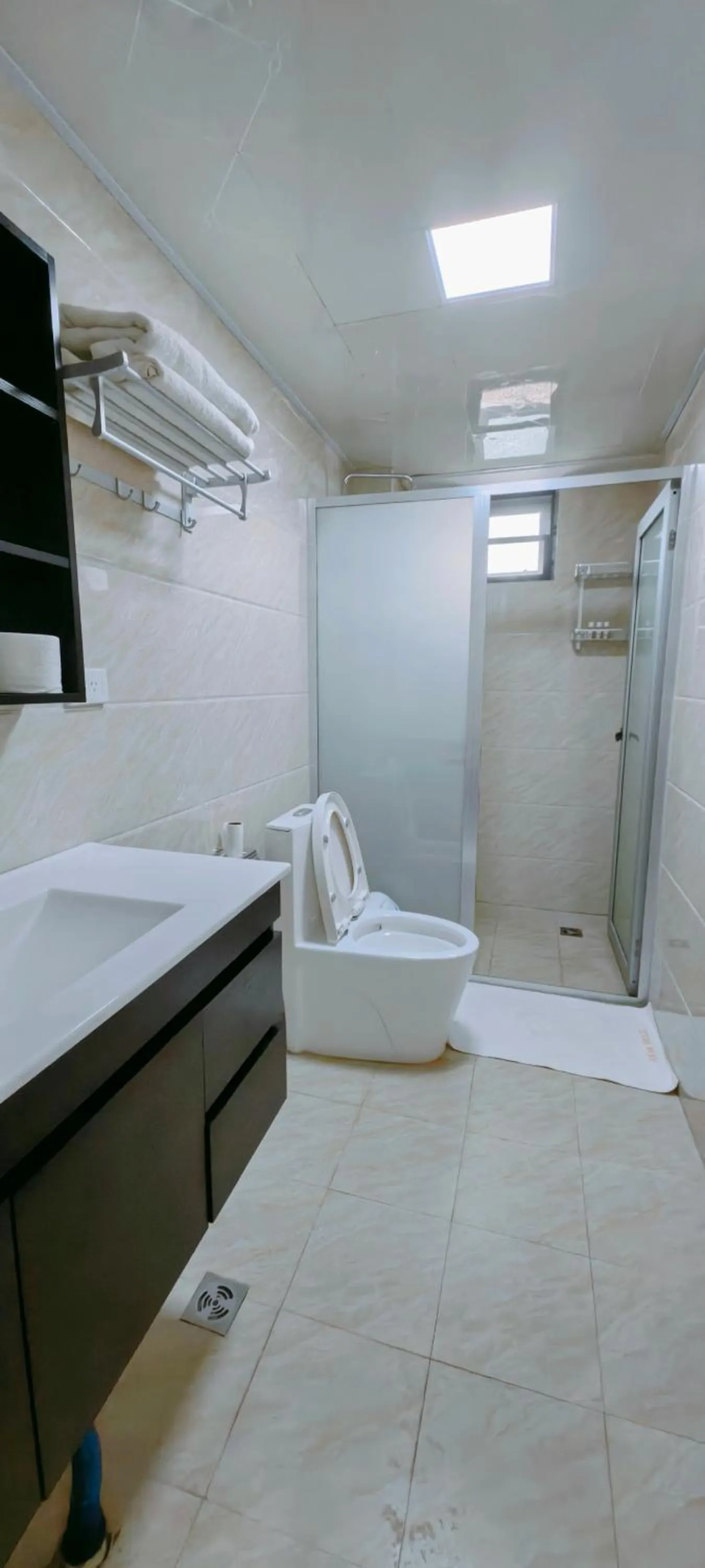 Toilet in Ocean Breeze Apartment Hotel