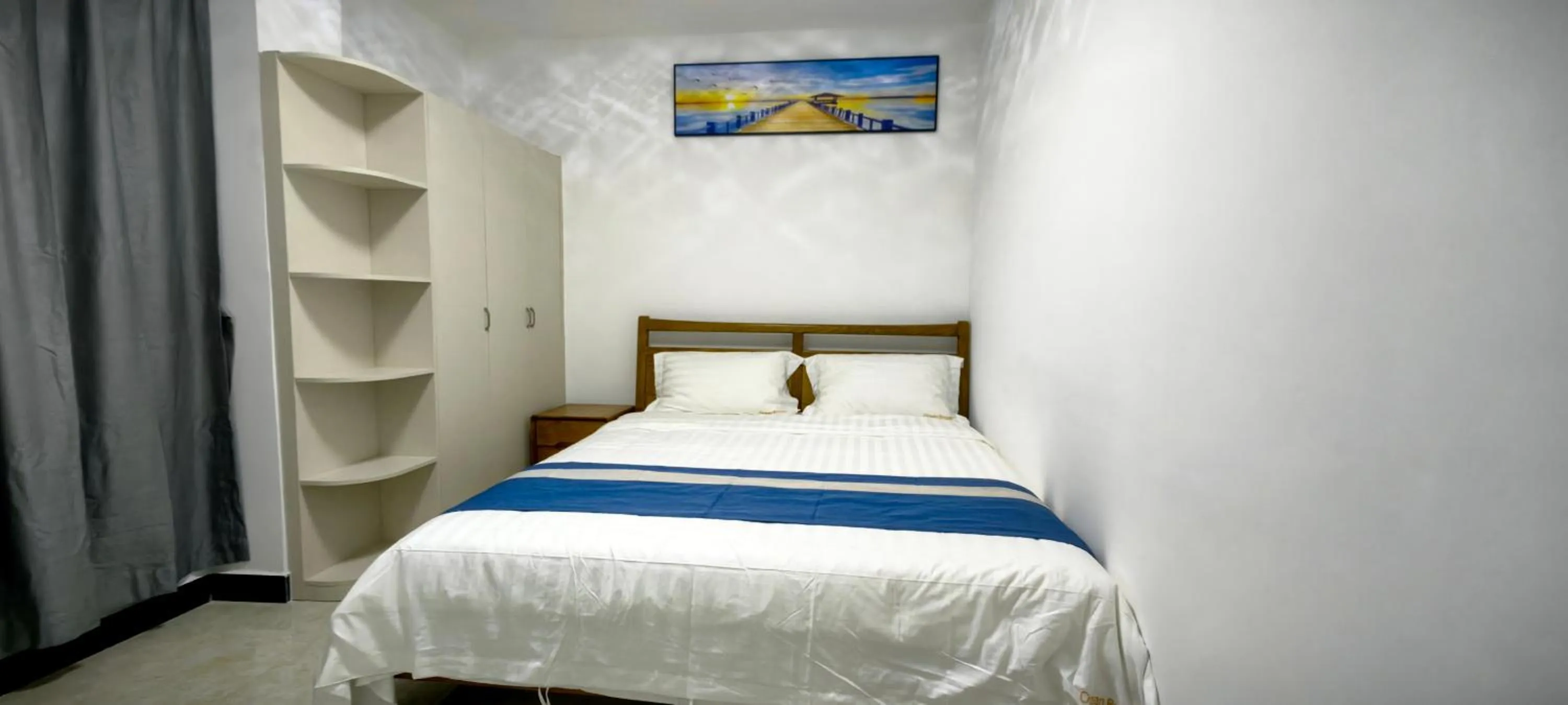 Bedroom, Bed in Ocean Breeze Apartment Hotel