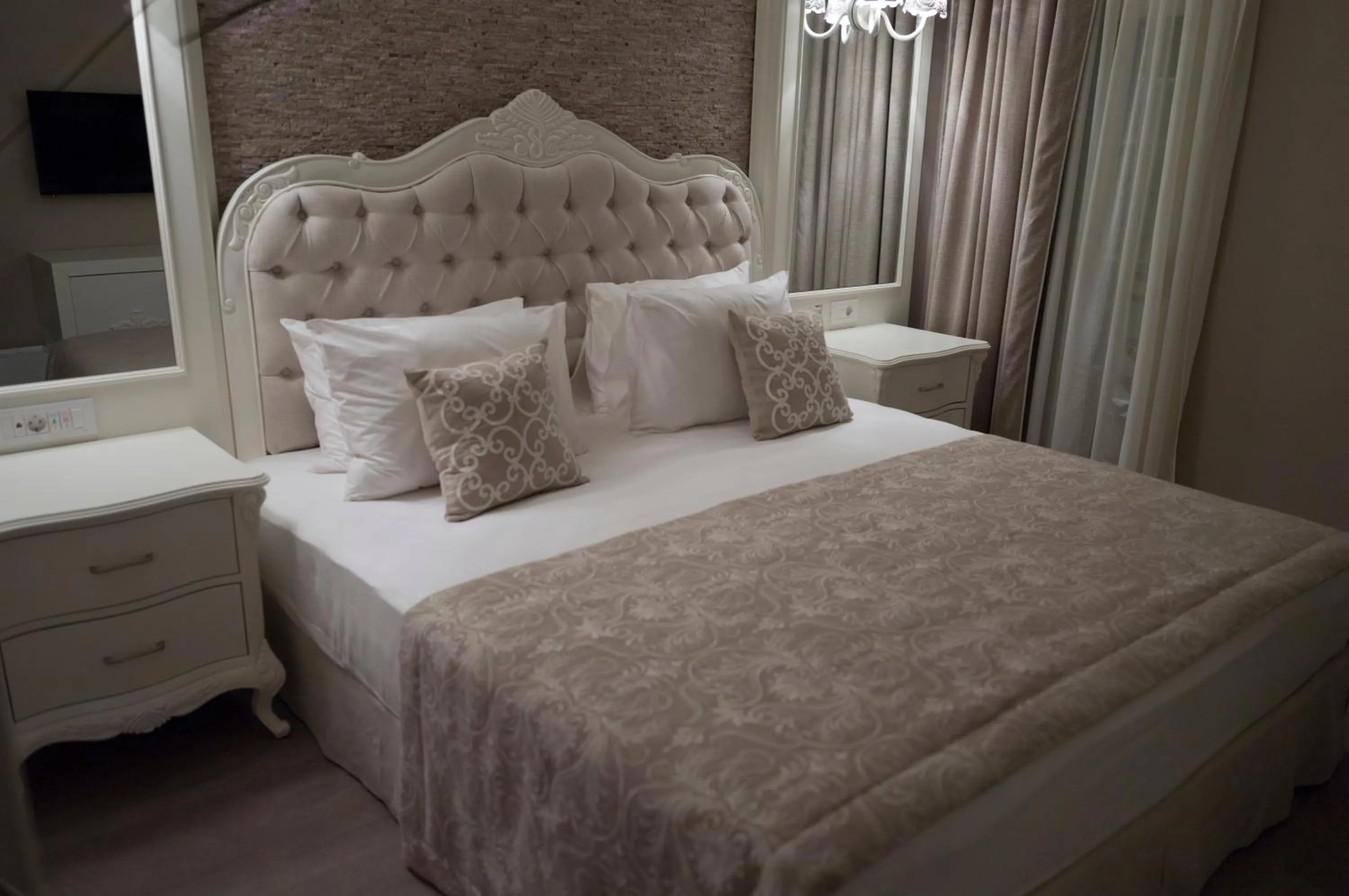 Bed in Ena Boutique Hotel & Residences