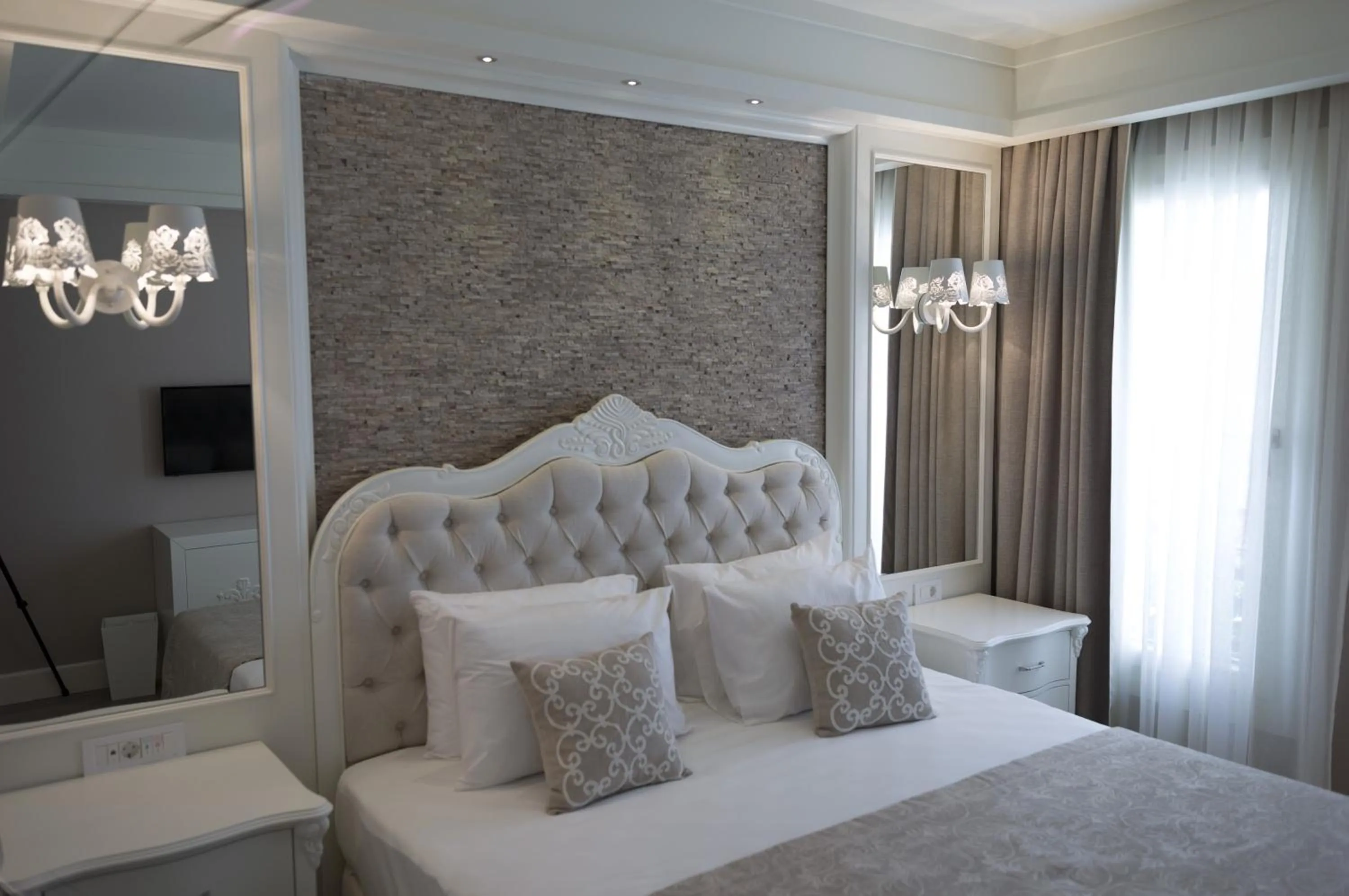 Bed in Ena Boutique Hotel & Residences
