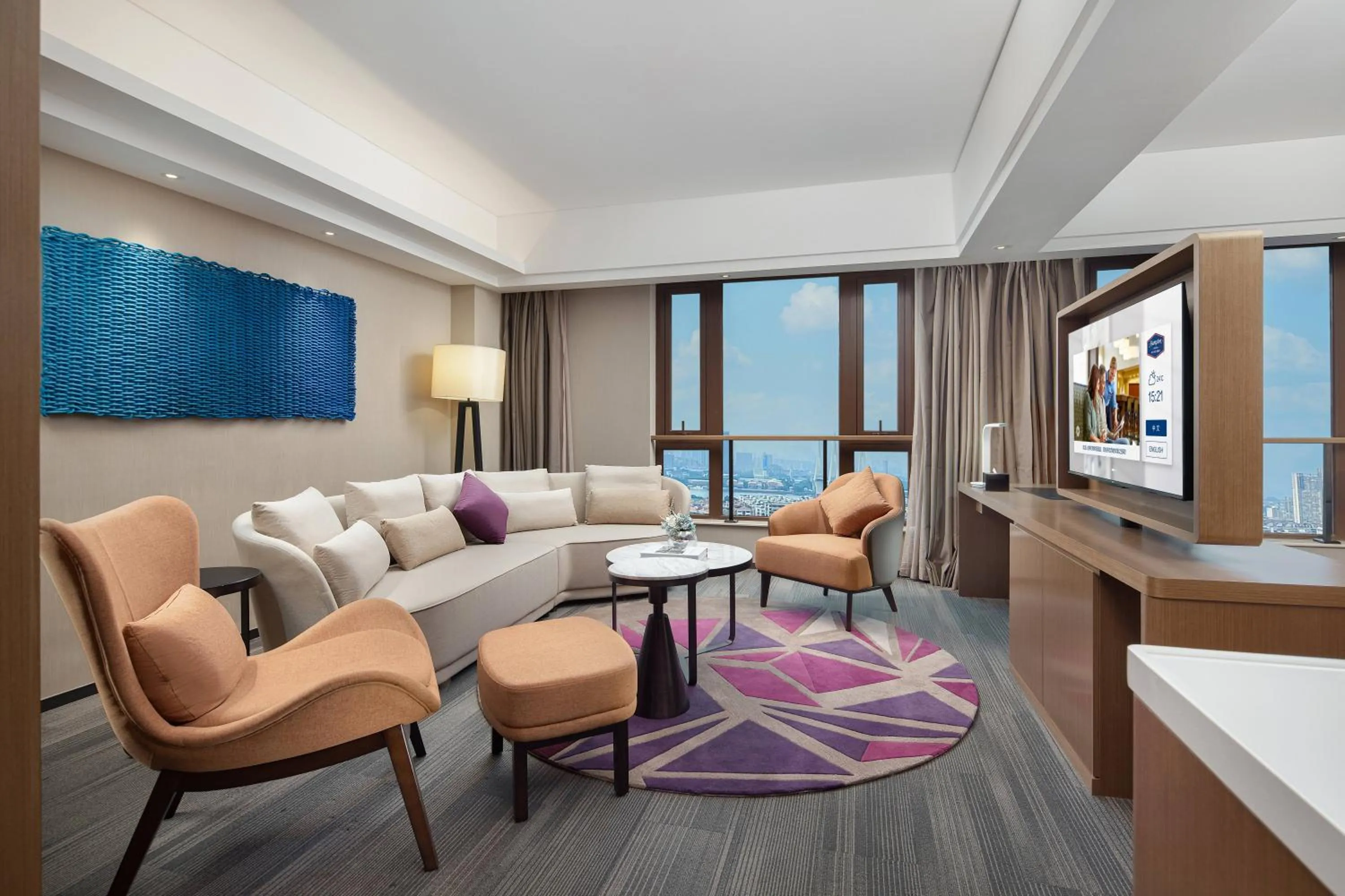 Living room in Hampton by Hilton Guangzhou Luoxi