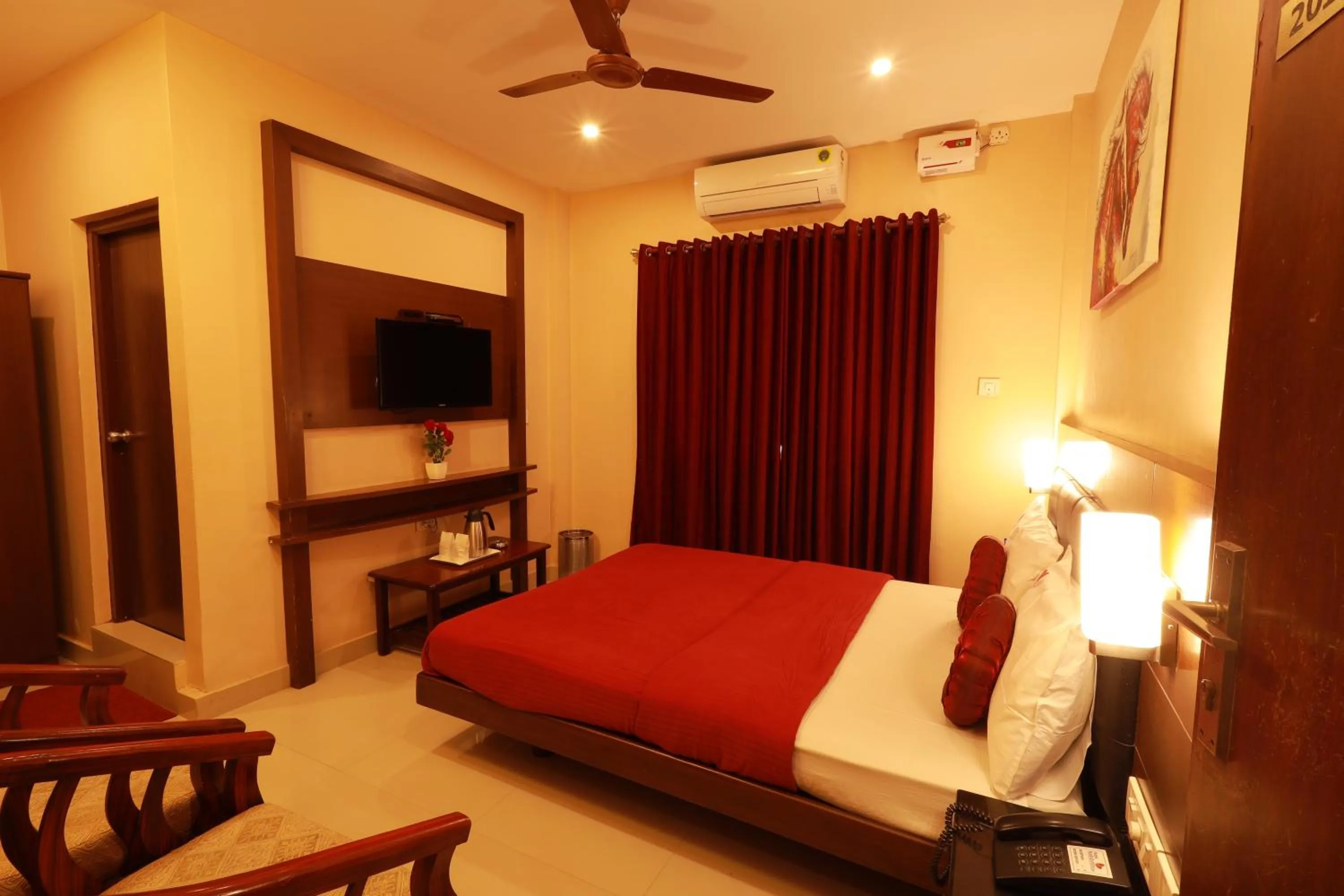fireplace, Bed in Hotel Nakshatra Inn VL Tuticorin