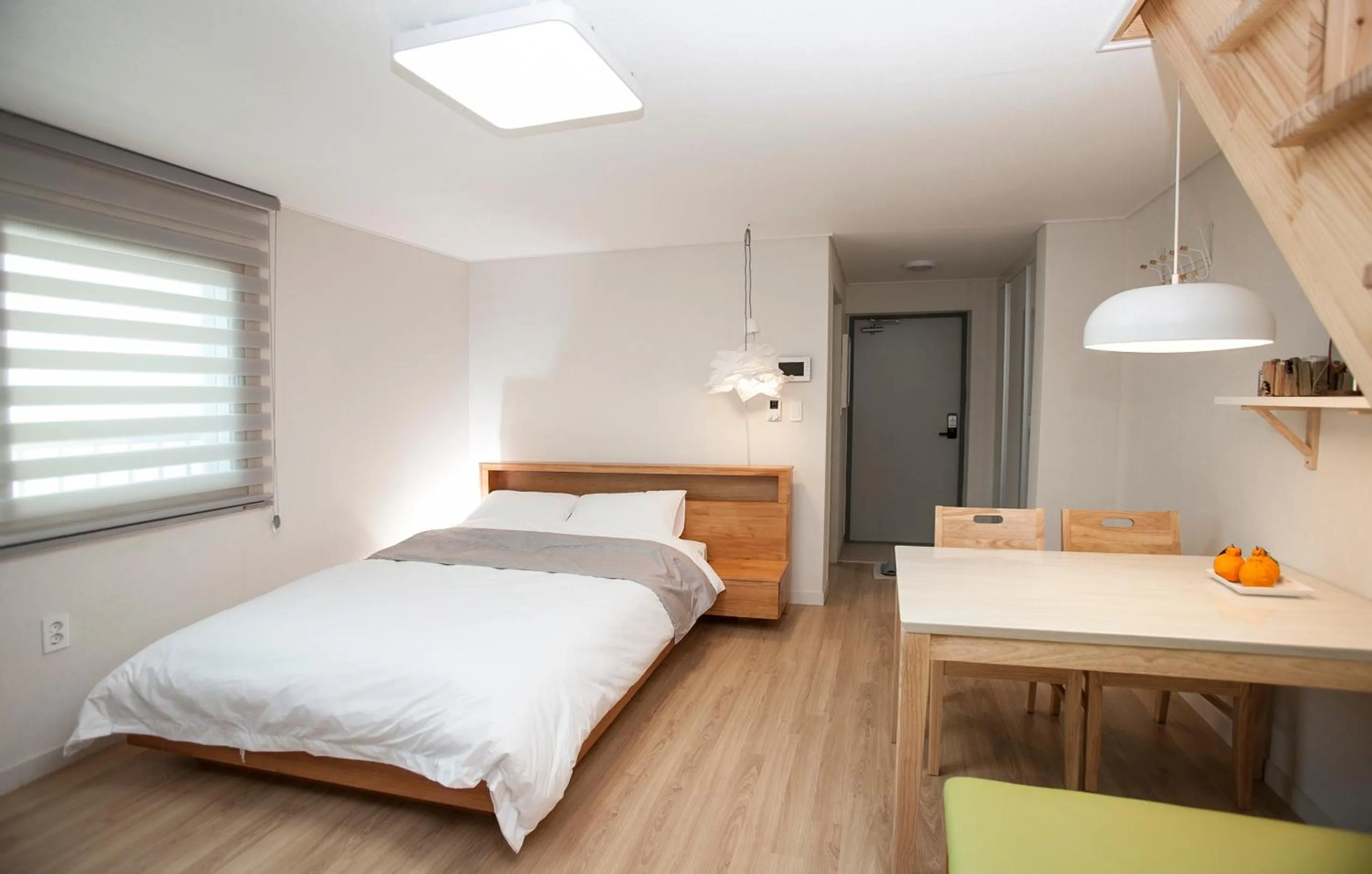 Bed in Jeju Aria Pension