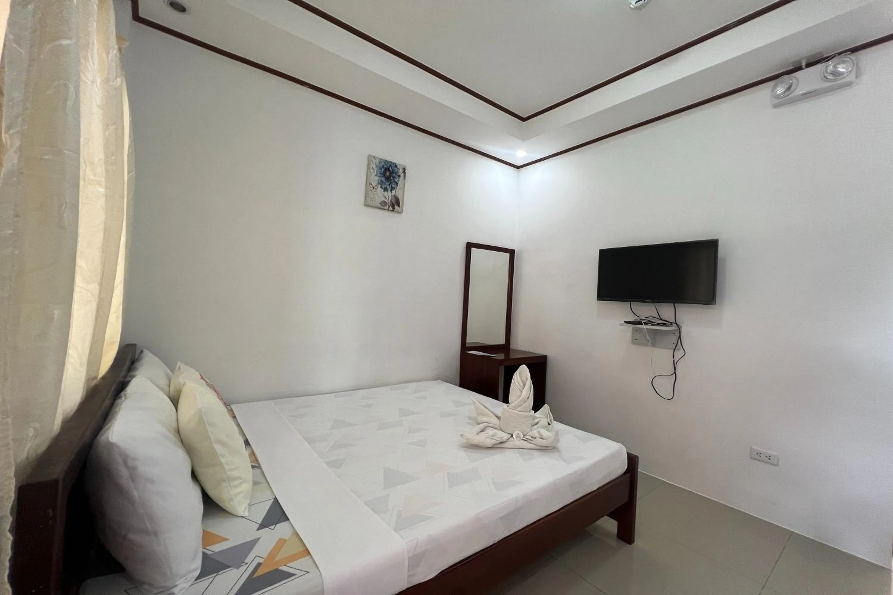 Bed in Dinah's Tourist Inn Puerto Princesa