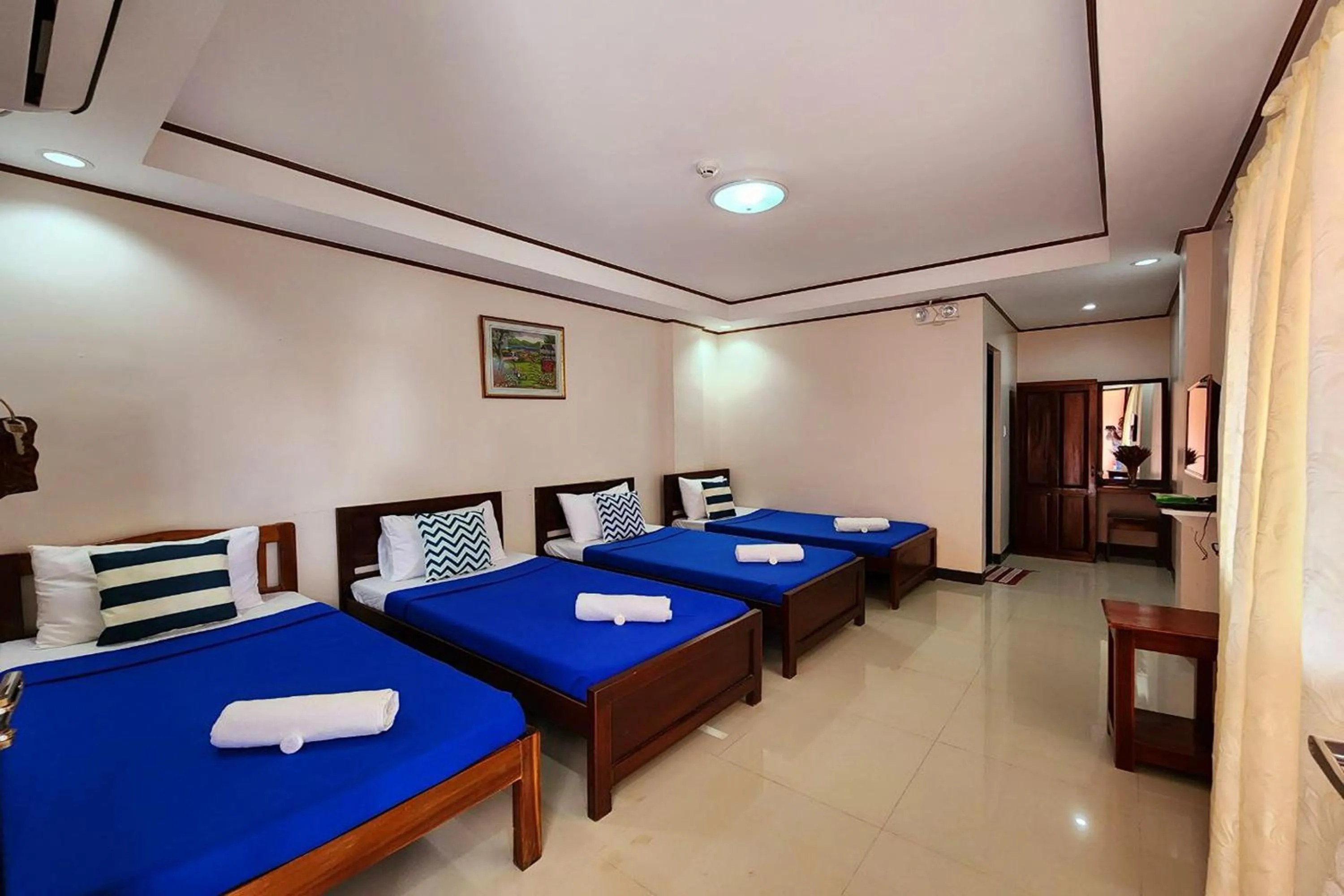 Bedroom, Bed in Dinah's Tourist Inn Puerto Princesa