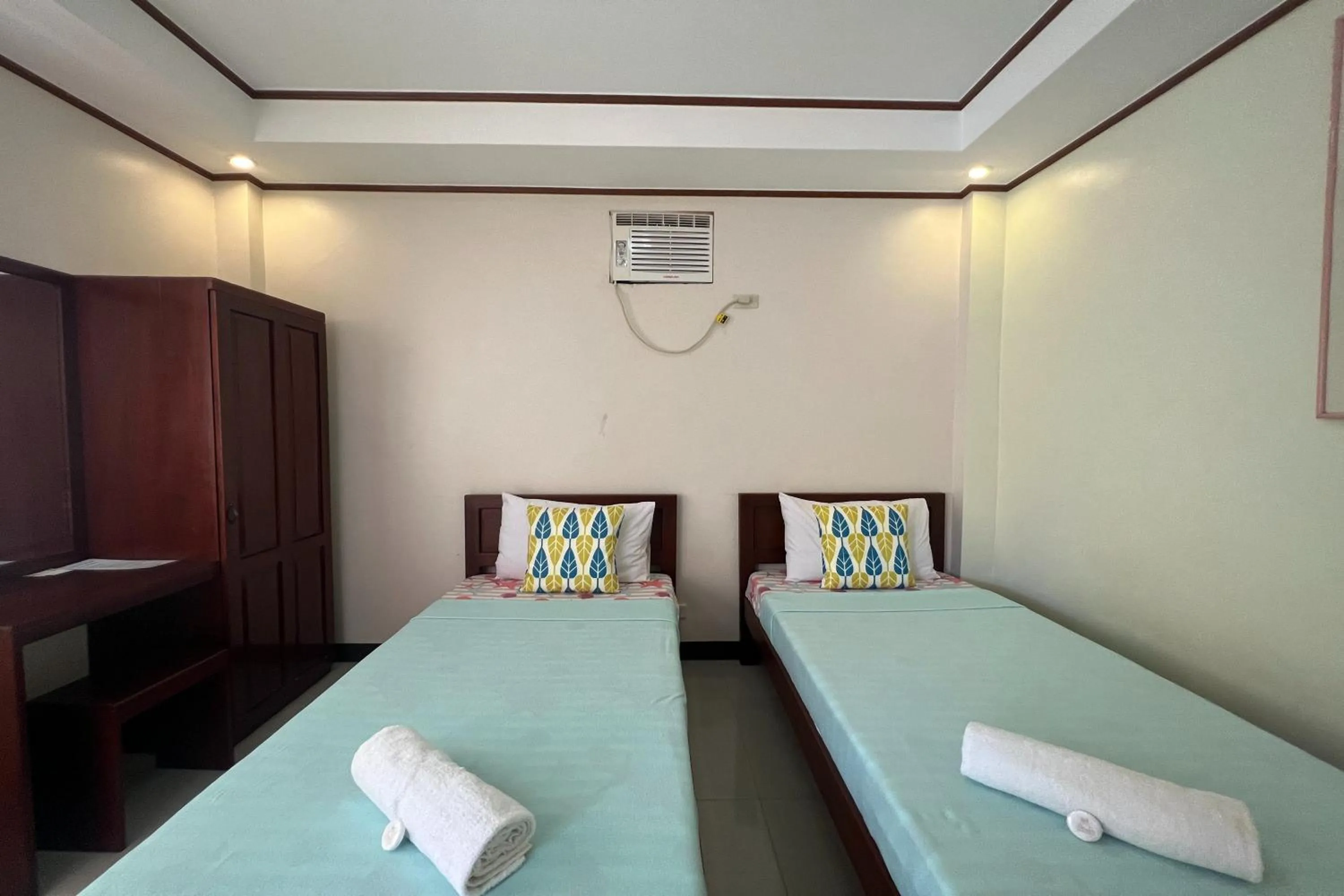 Bedroom, Bed in Dinah's Tourist Inn Puerto Princesa