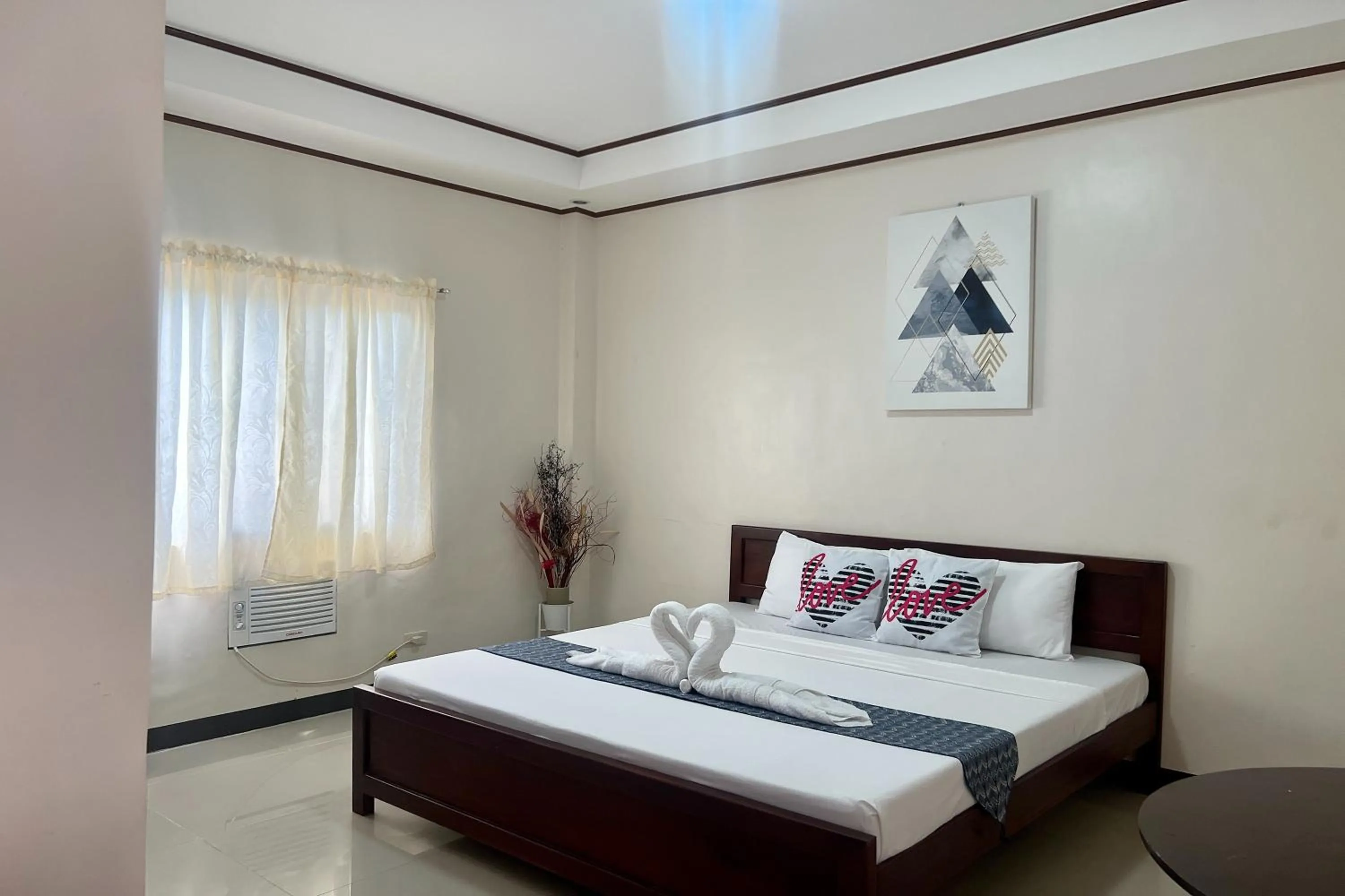 Bedroom, Bed in Dinah's Tourist Inn Puerto Princesa