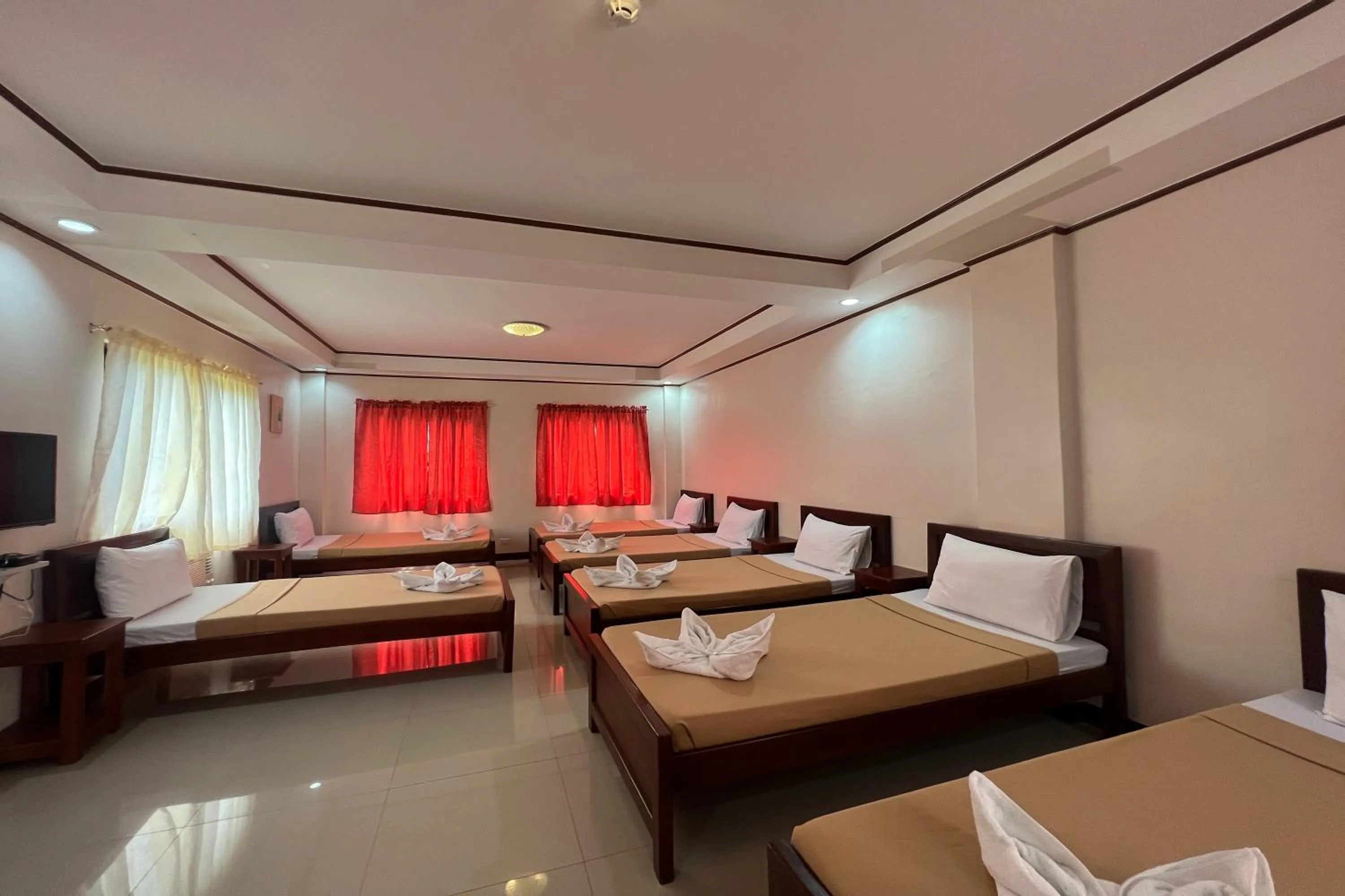 Bedroom, Bed in Dinah's Tourist Inn Puerto Princesa