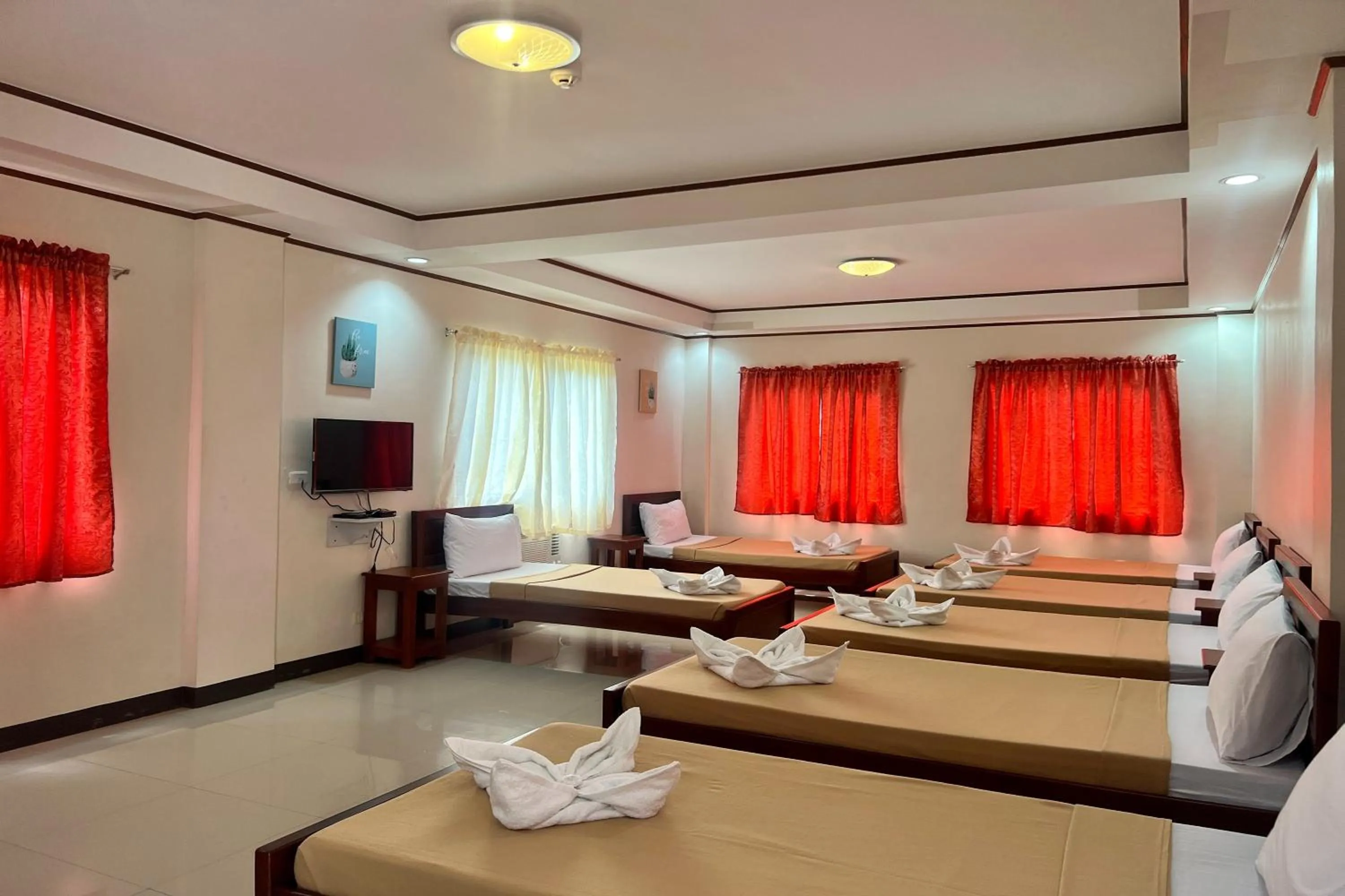 Bed in Dinah's Tourist Inn Puerto Princesa