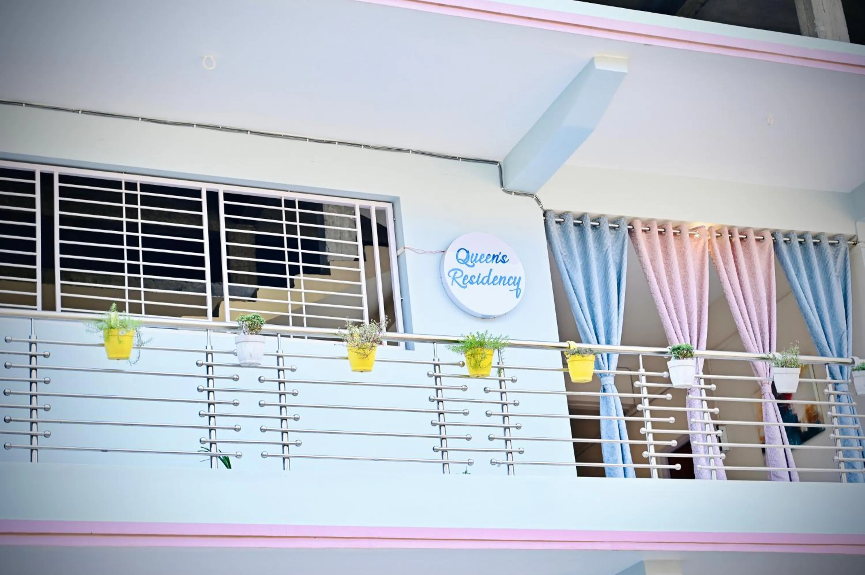 Property logo or sign in Queen's Residency