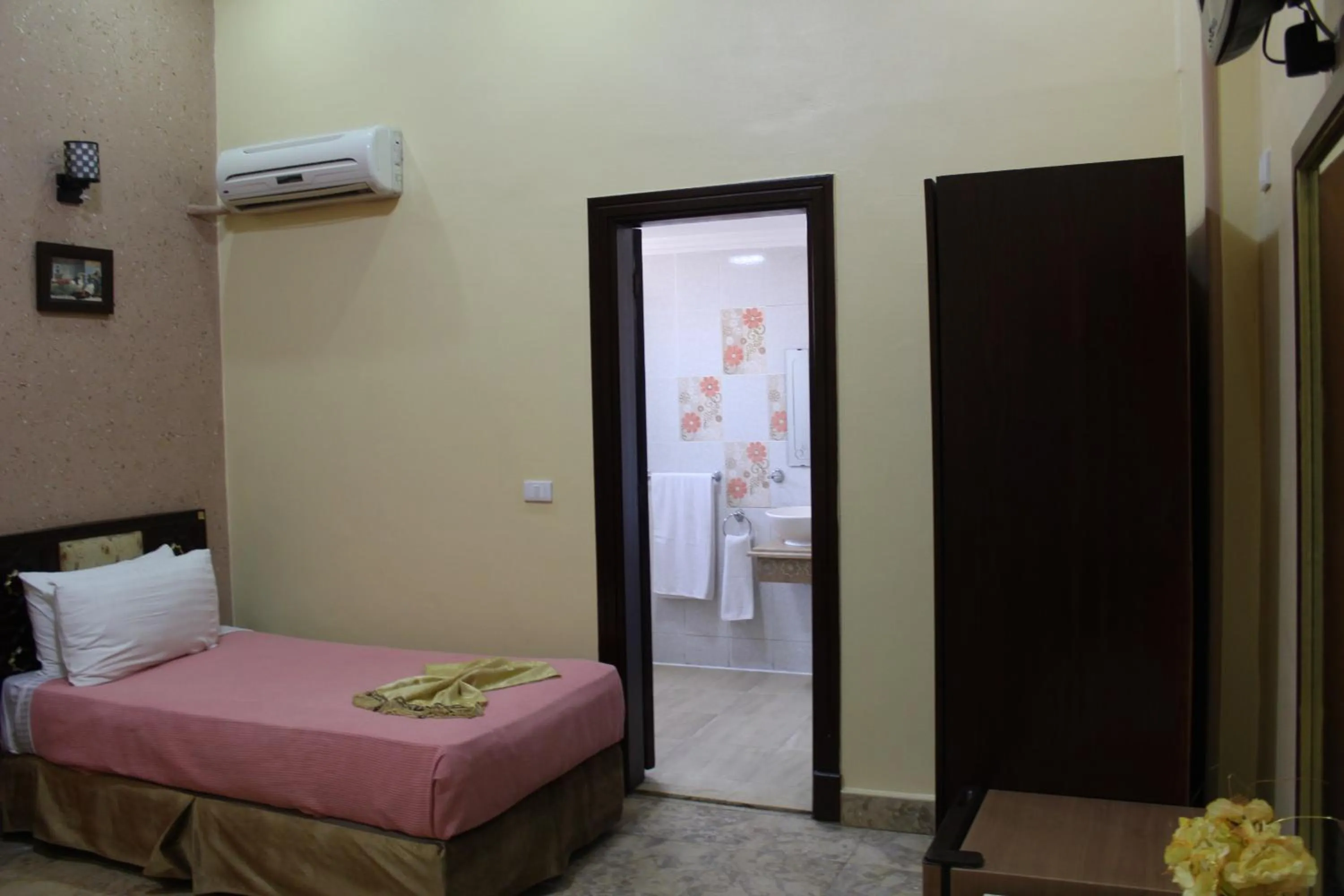 Bed in City View Museum Hotel