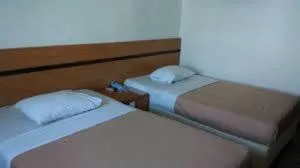 Bedroom in Paradise Hotel