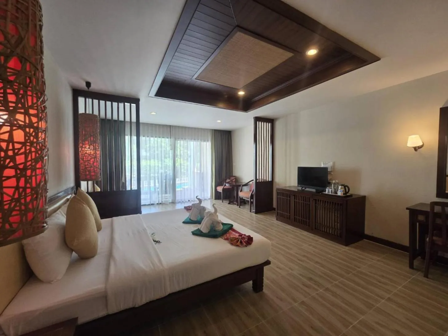 Bed in Hotel and Beach Bungalow at Lanta Resort