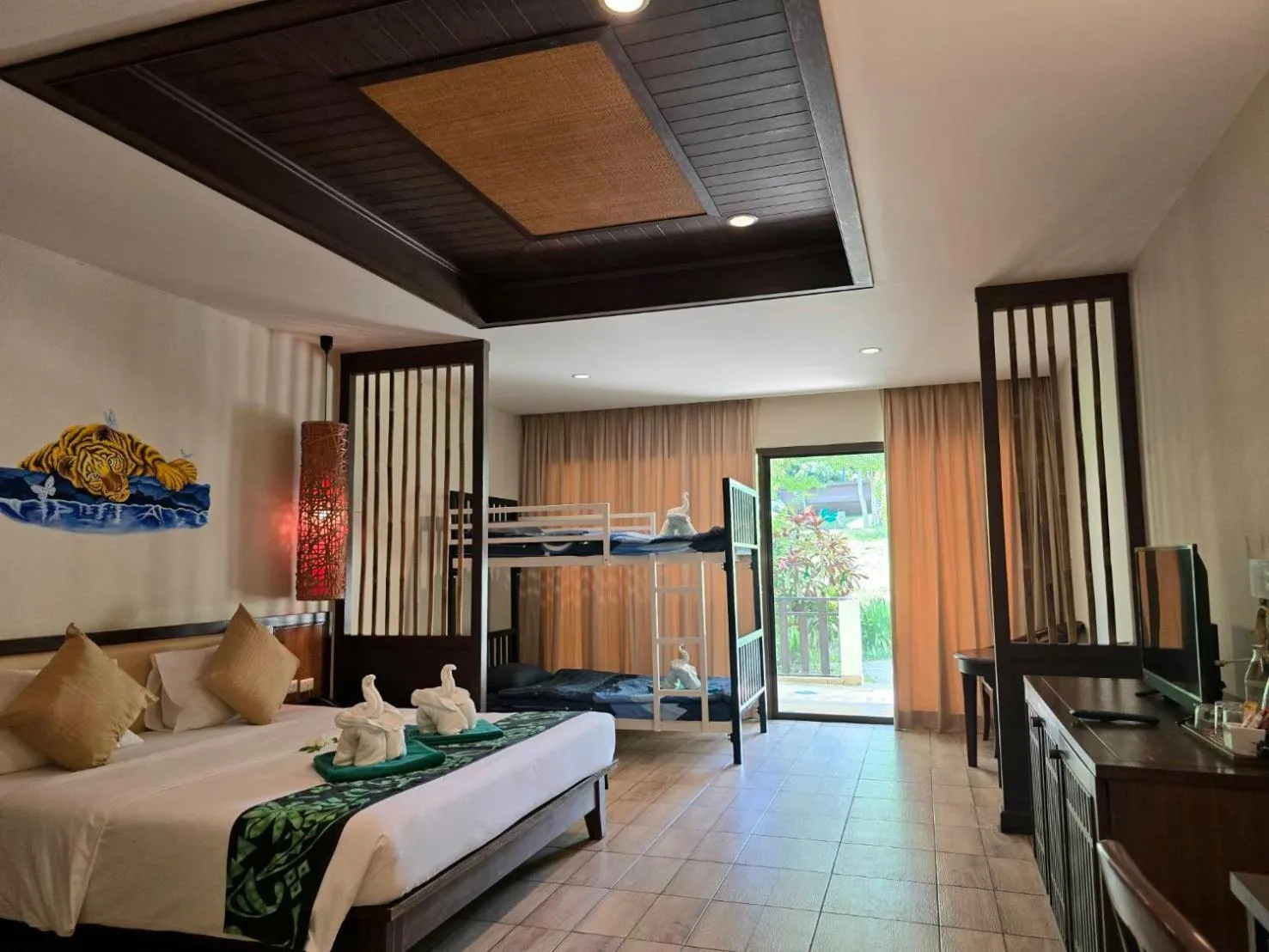 Bed in Hotel and Beach Bungalow at Lanta Resort