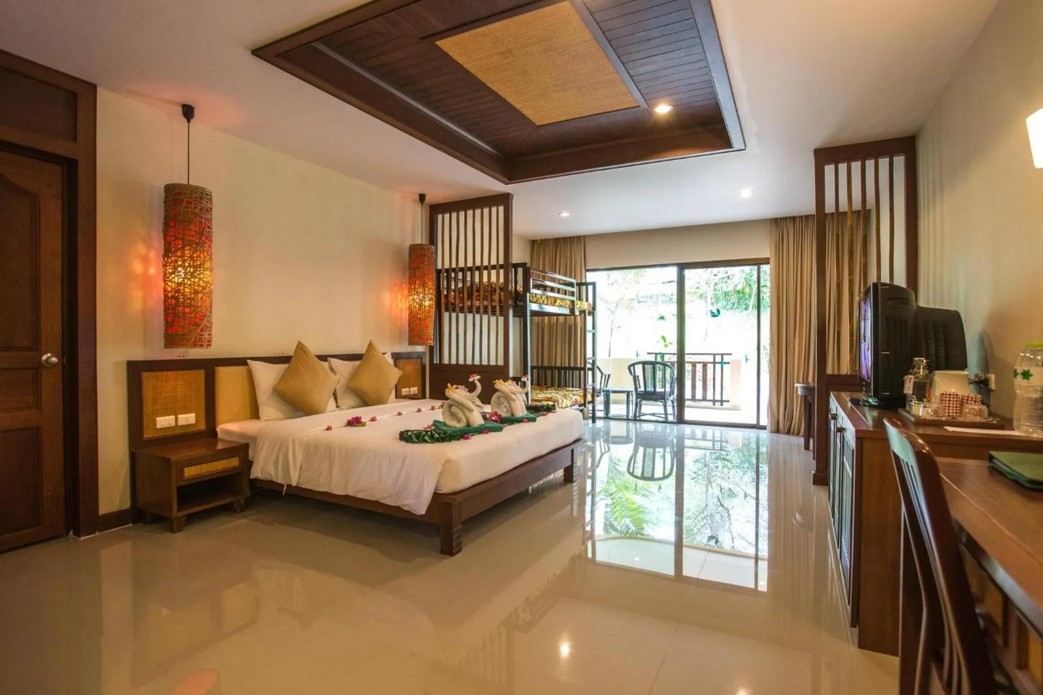 Bed in Hotel and Beach Bungalow at Lanta Resort