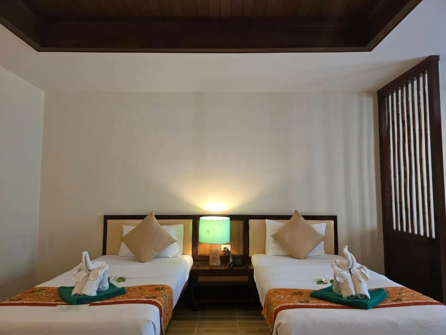 Bed in Hotel and Beach Bungalow at Lanta Resort