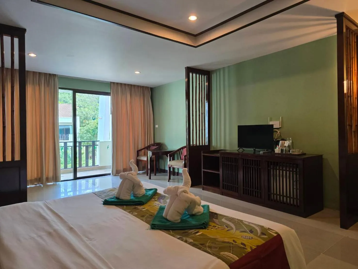 Bed in Hotel and Beach Bungalow at Lanta Resort