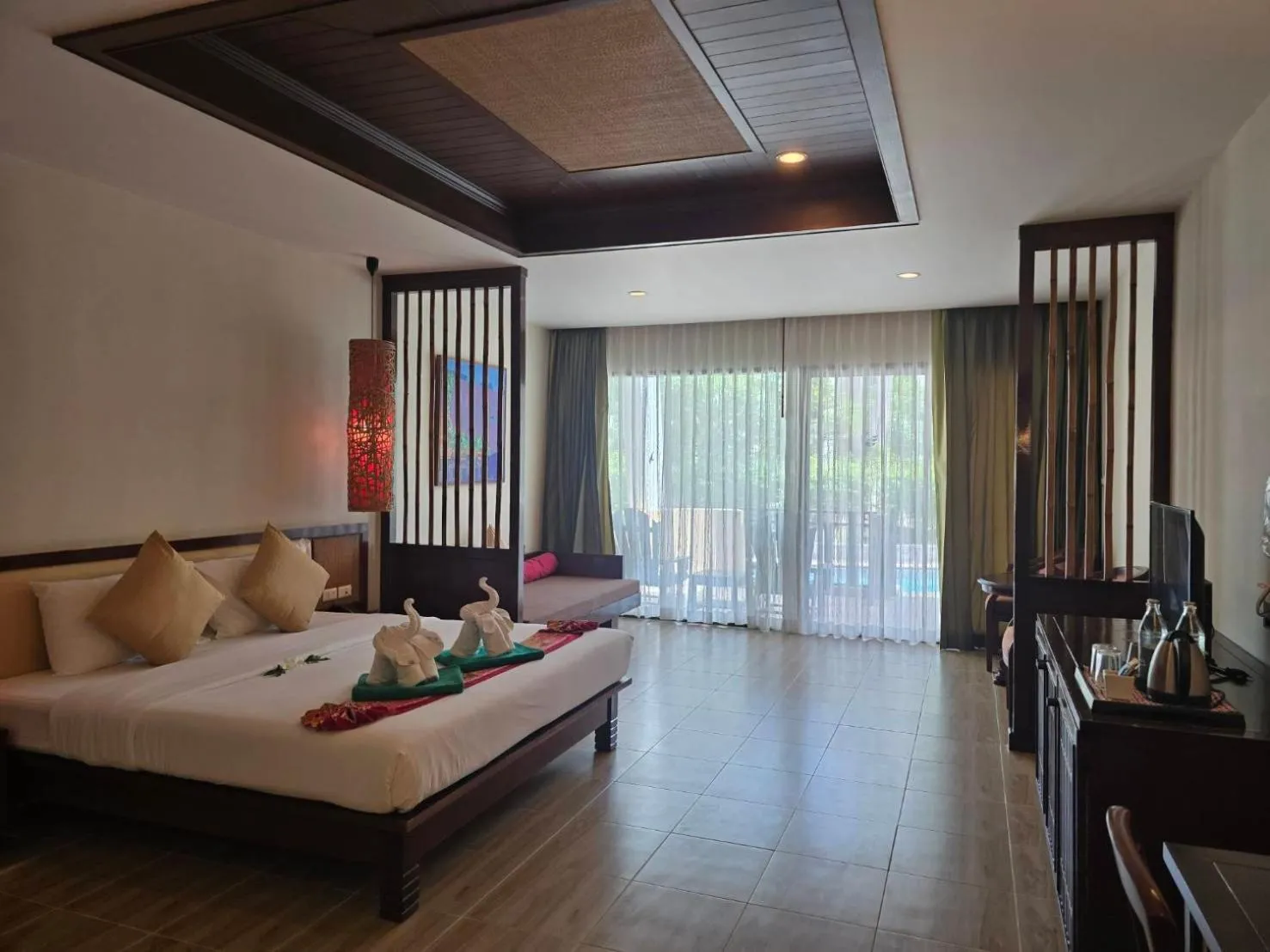 Bed in Hotel and Beach Bungalow at Lanta Resort