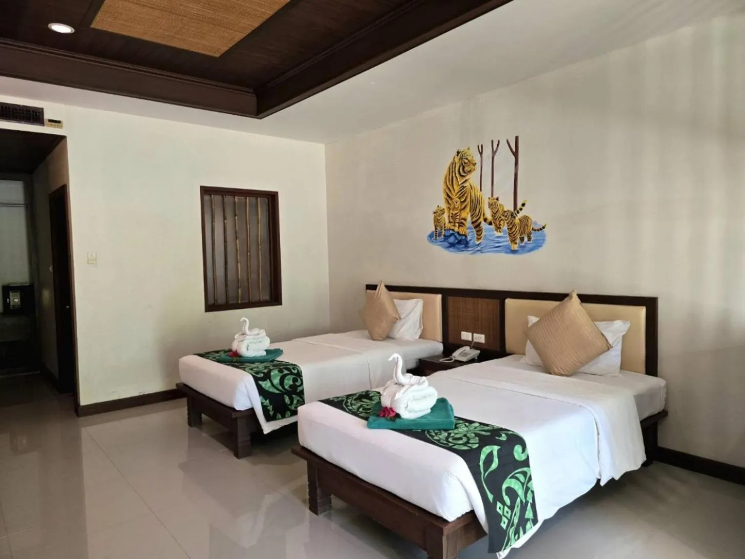 Bed in Hotel and Beach Bungalow at Lanta Resort
