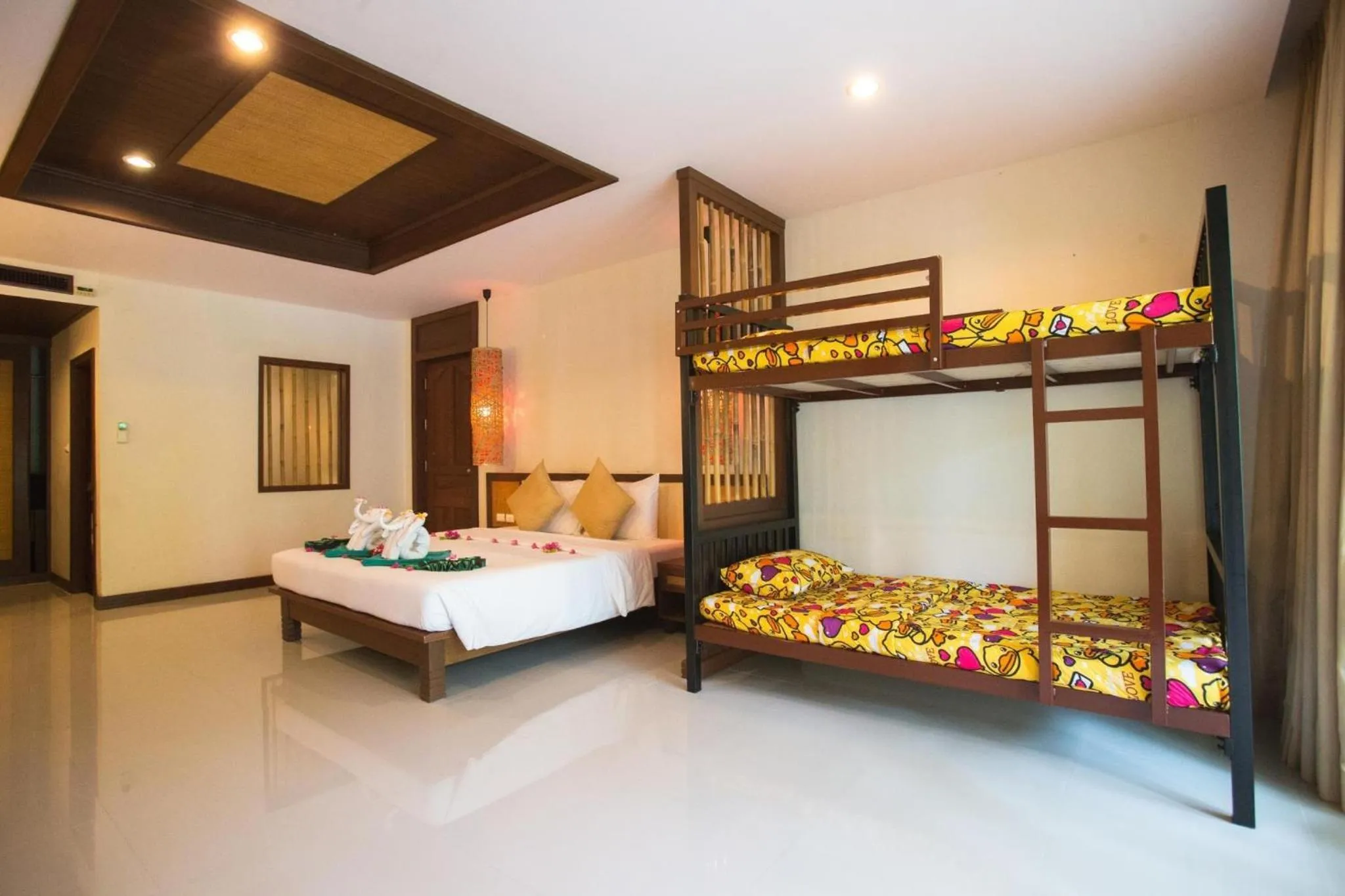Bed in Hotel and Beach Bungalow at Lanta Resort