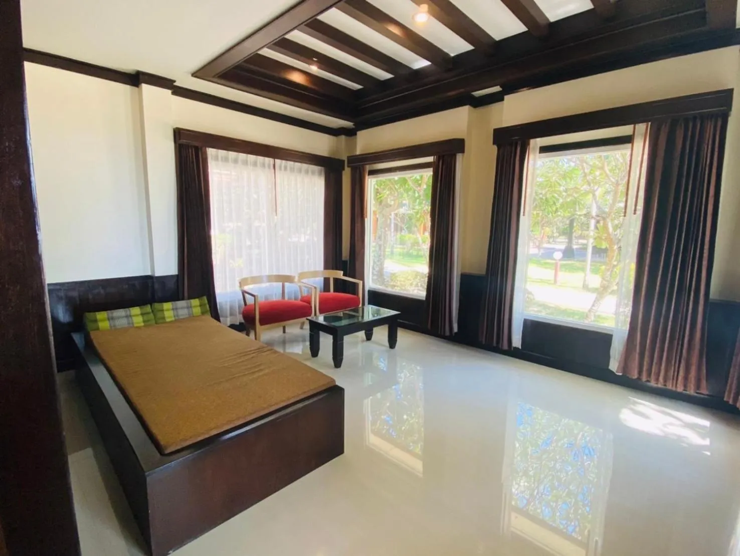 Living room, Bed in Hotel and Beach Bungalow at Lanta Resort