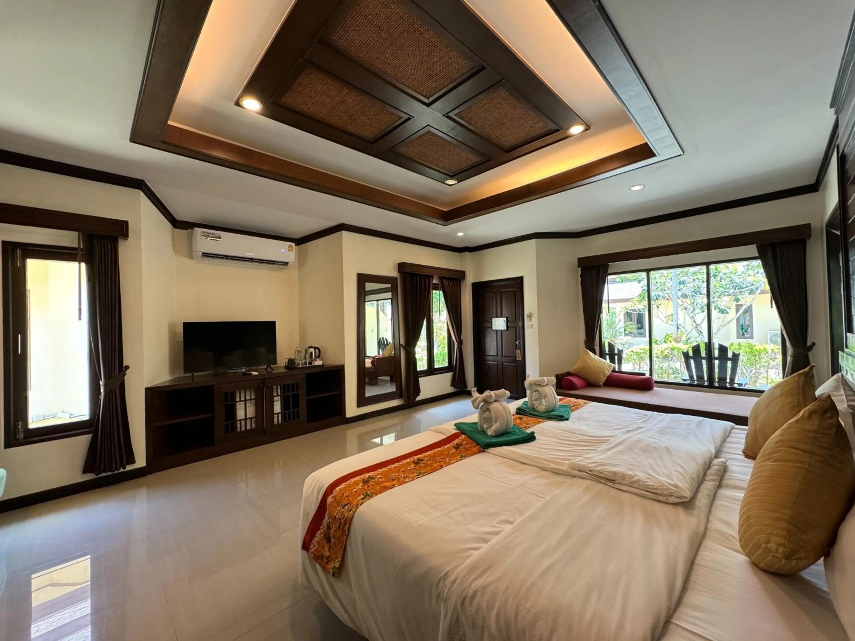 Bed in Hotel and Beach Bungalow at Lanta Resort
