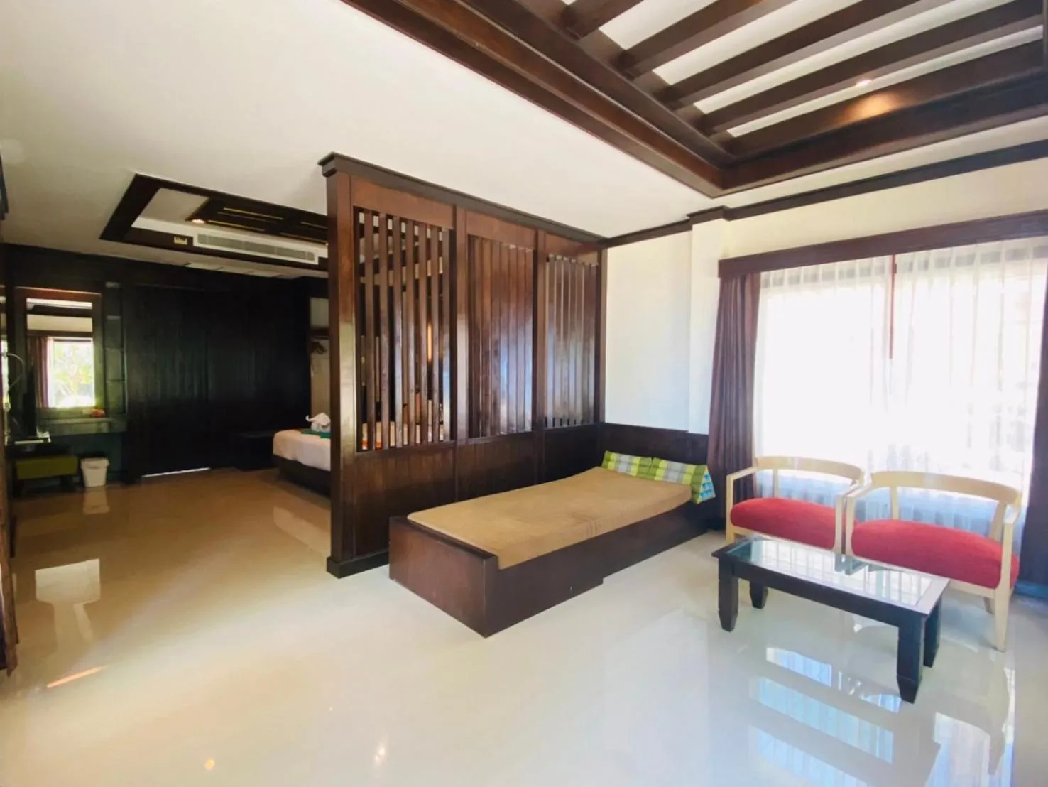 Photo of the whole room, Bed in Hotel and Beach Bungalow at Lanta Resort