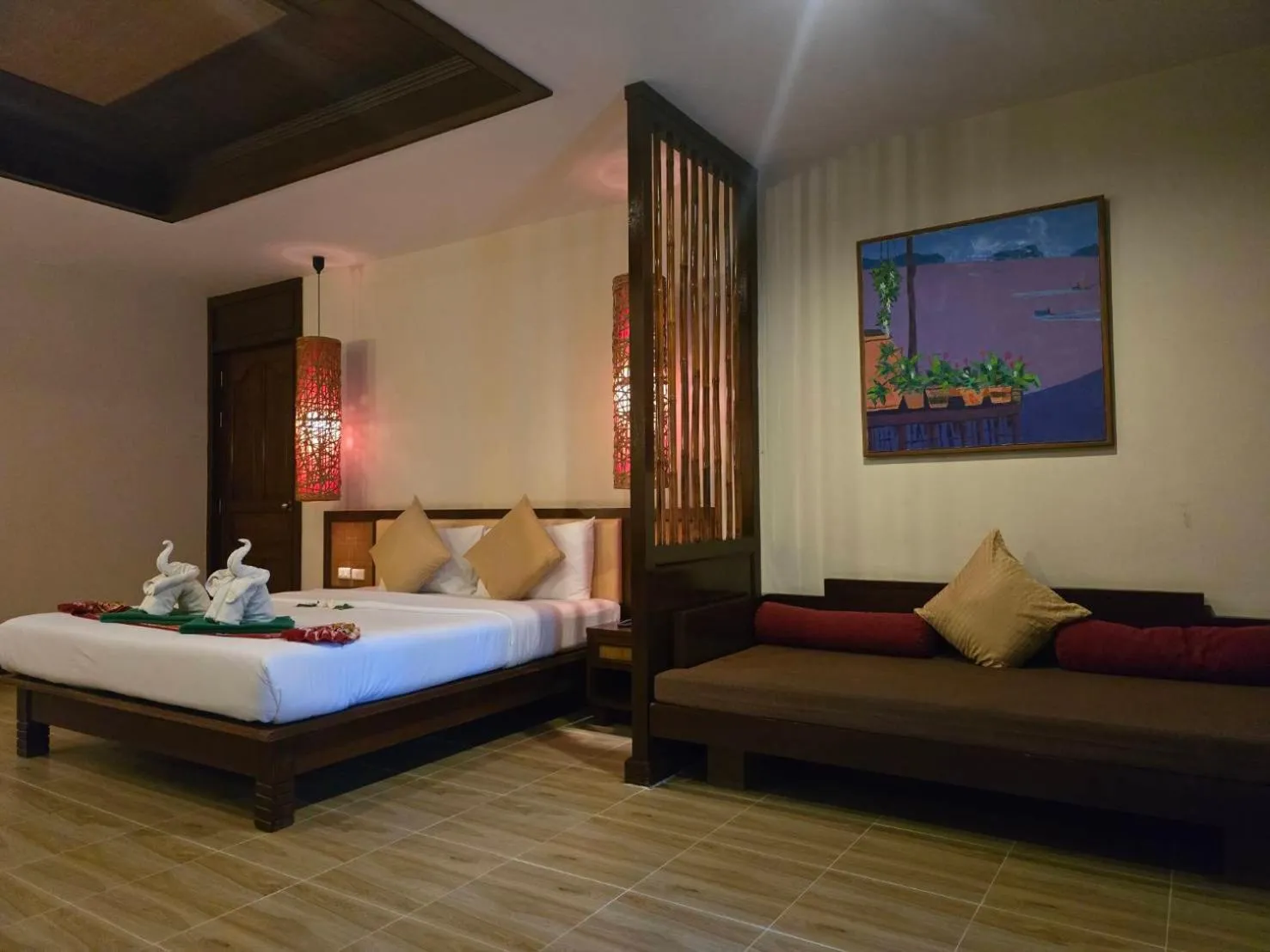 Bed in Hotel and Beach Bungalow at Lanta Resort