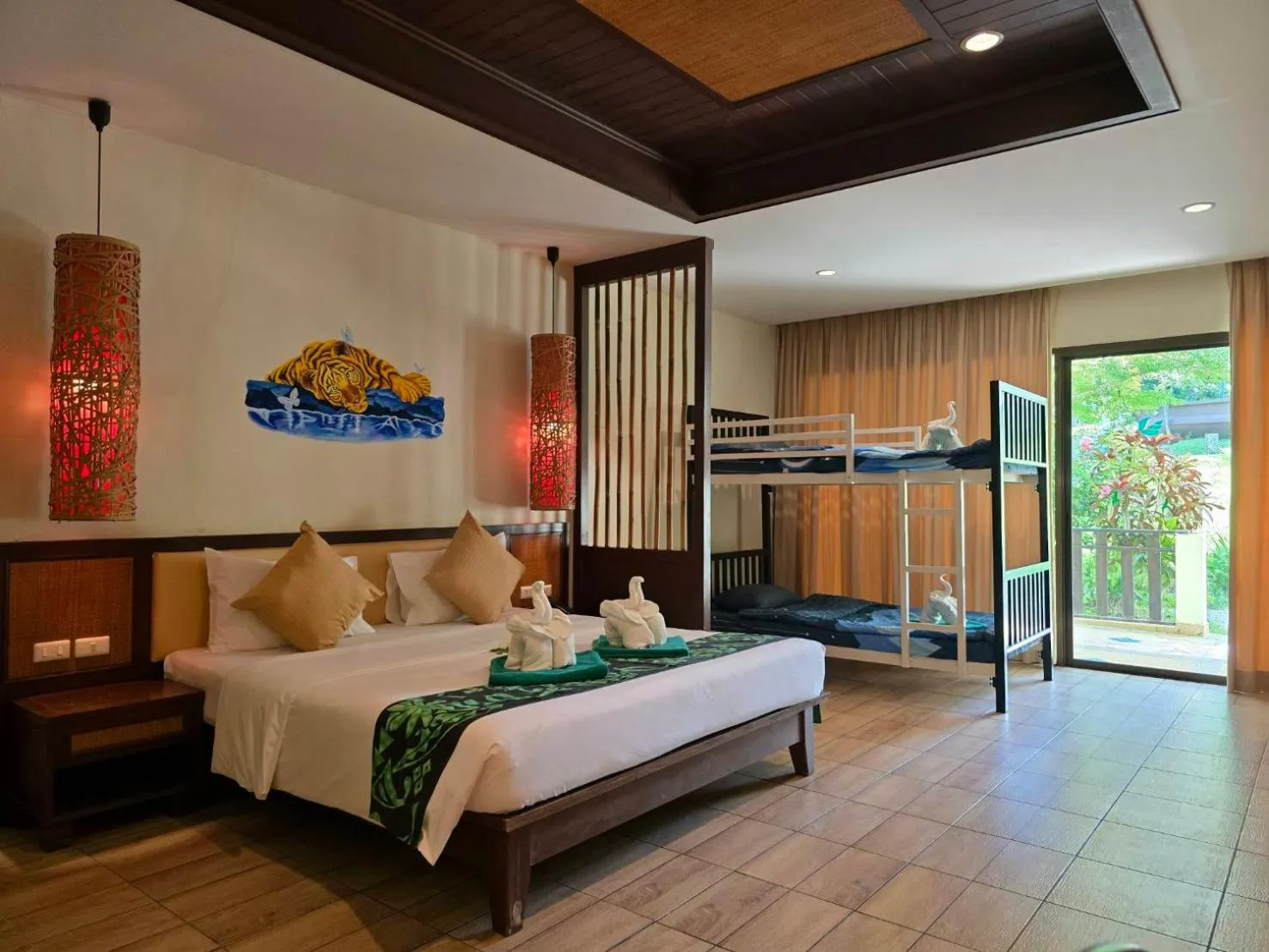 Bed in Hotel and Beach Bungalow at Lanta Resort